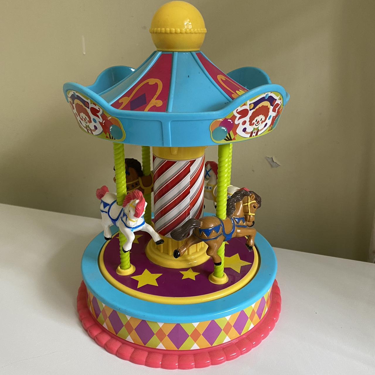 Carousel merry go round toy figurine 🎠. Brightly... - Depop