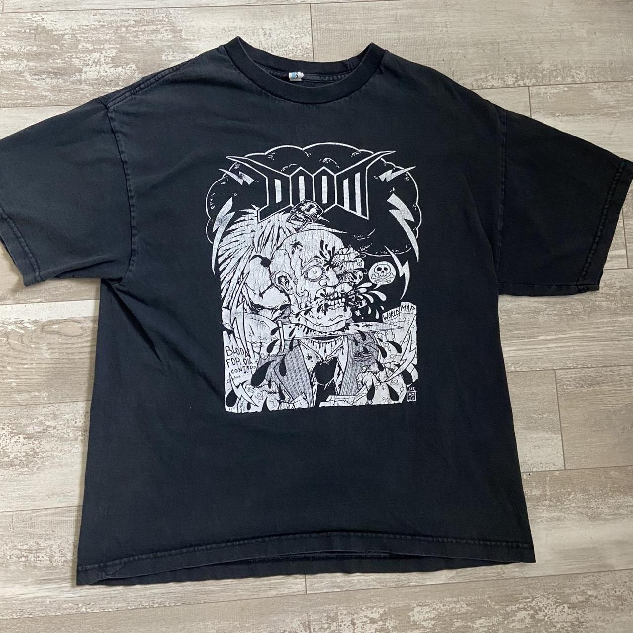 black doom band tee graphic is a bit cracked size:... - Depop