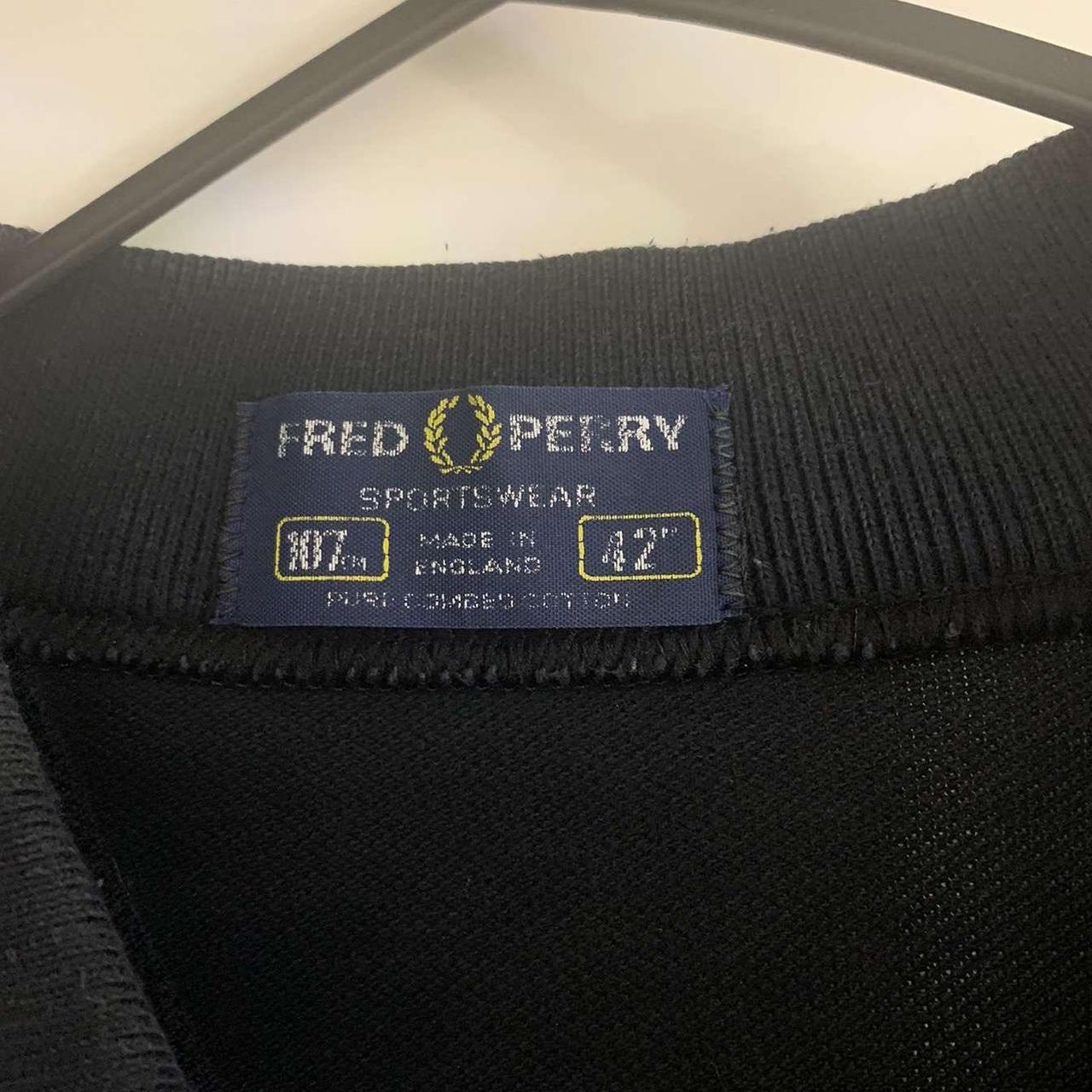 Fred Perry black polo shirt Meant to be a Depop
