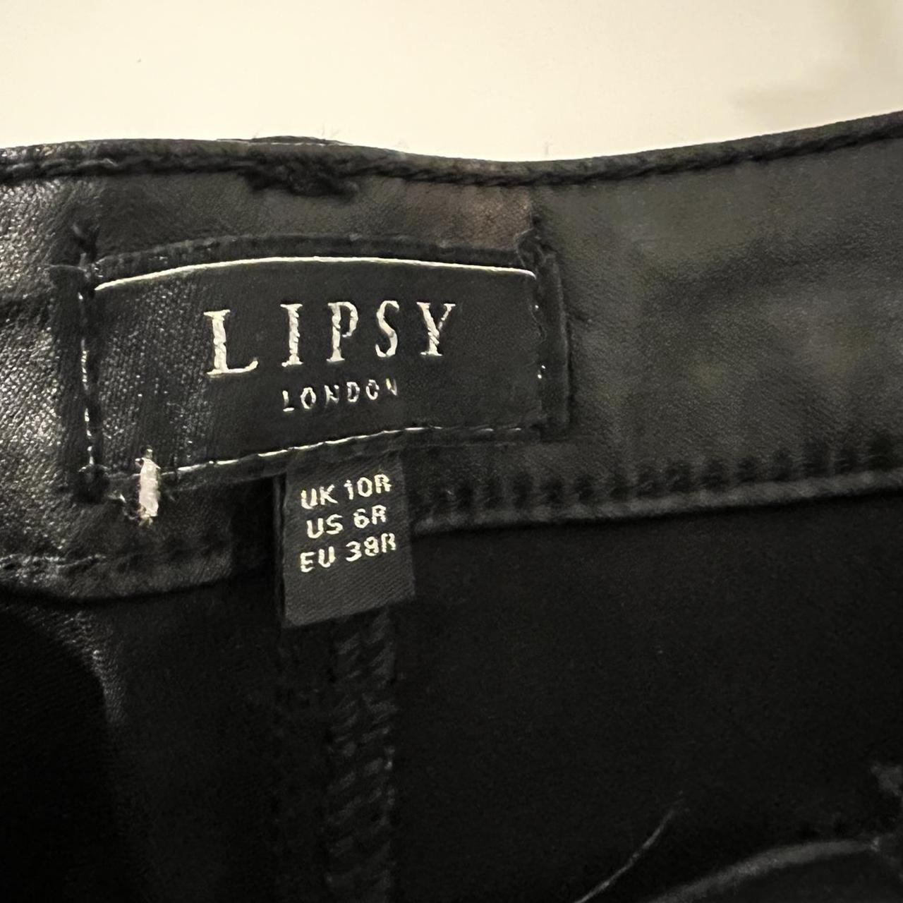 Black Lipsy coated jeans with gold hardware. Never... Depop