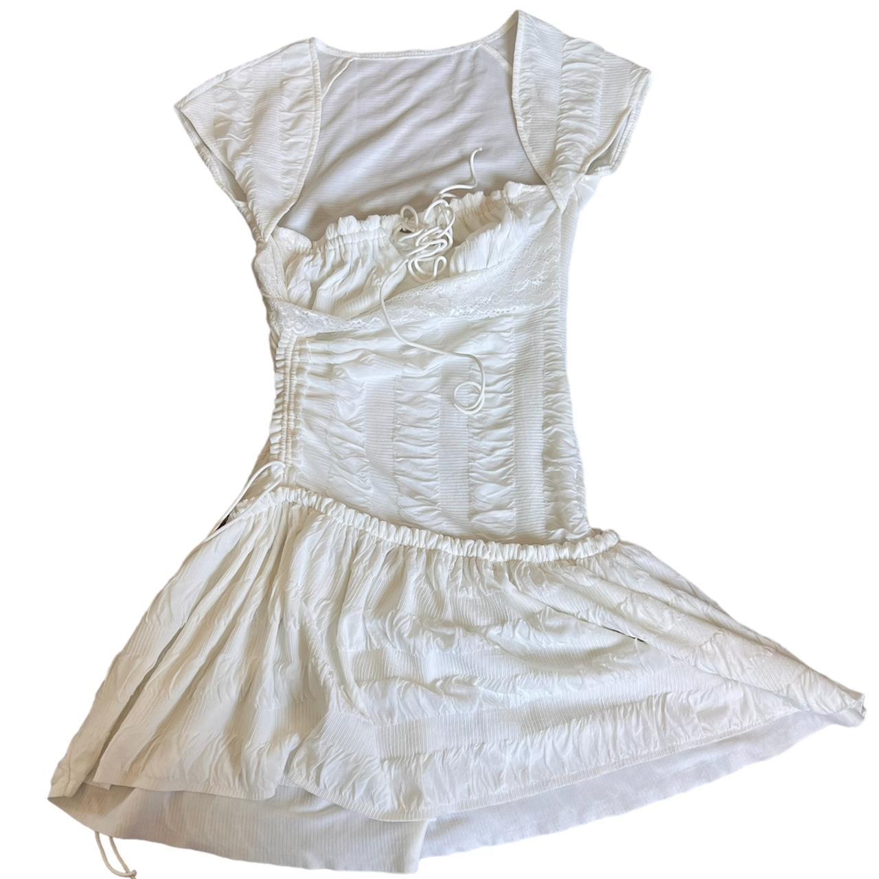 very flattering dress lays flat oddly but... Depop