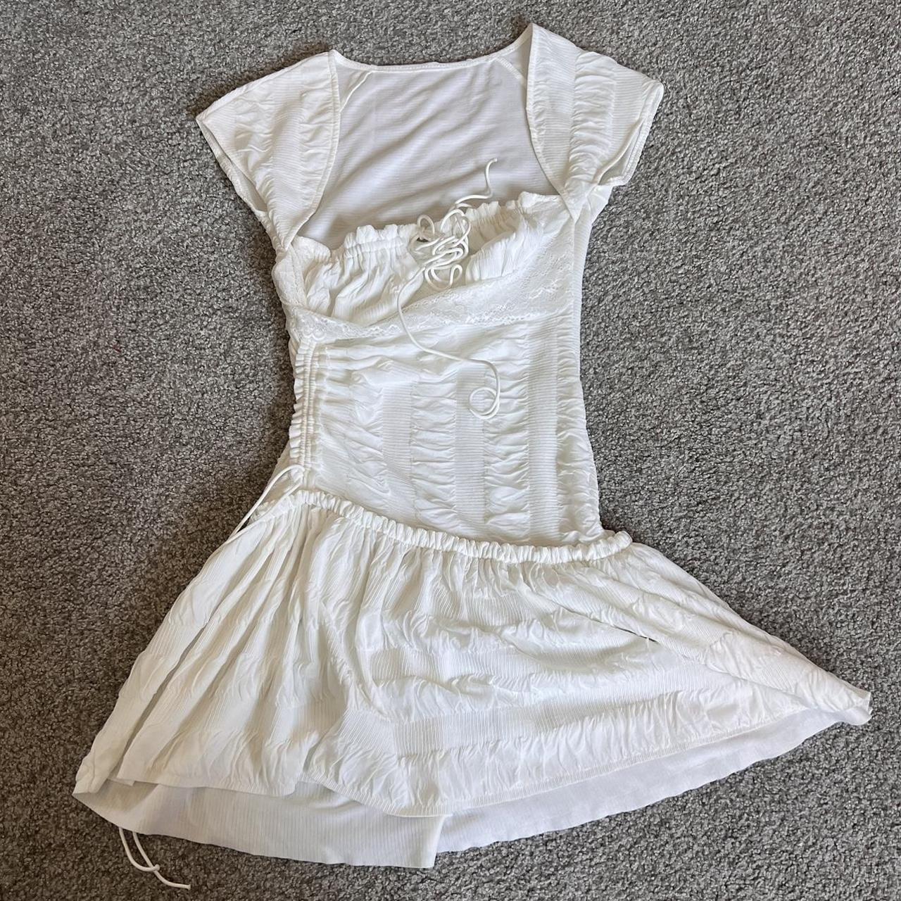 very flattering dress lays flat oddly but... Depop