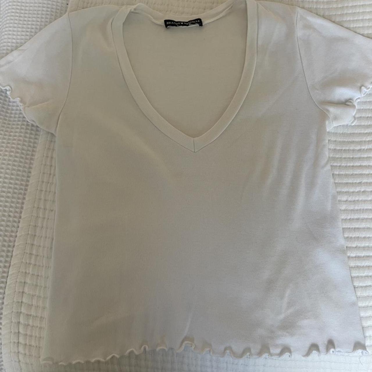 Brandy Melville white v neck top Frill detailing... Depop