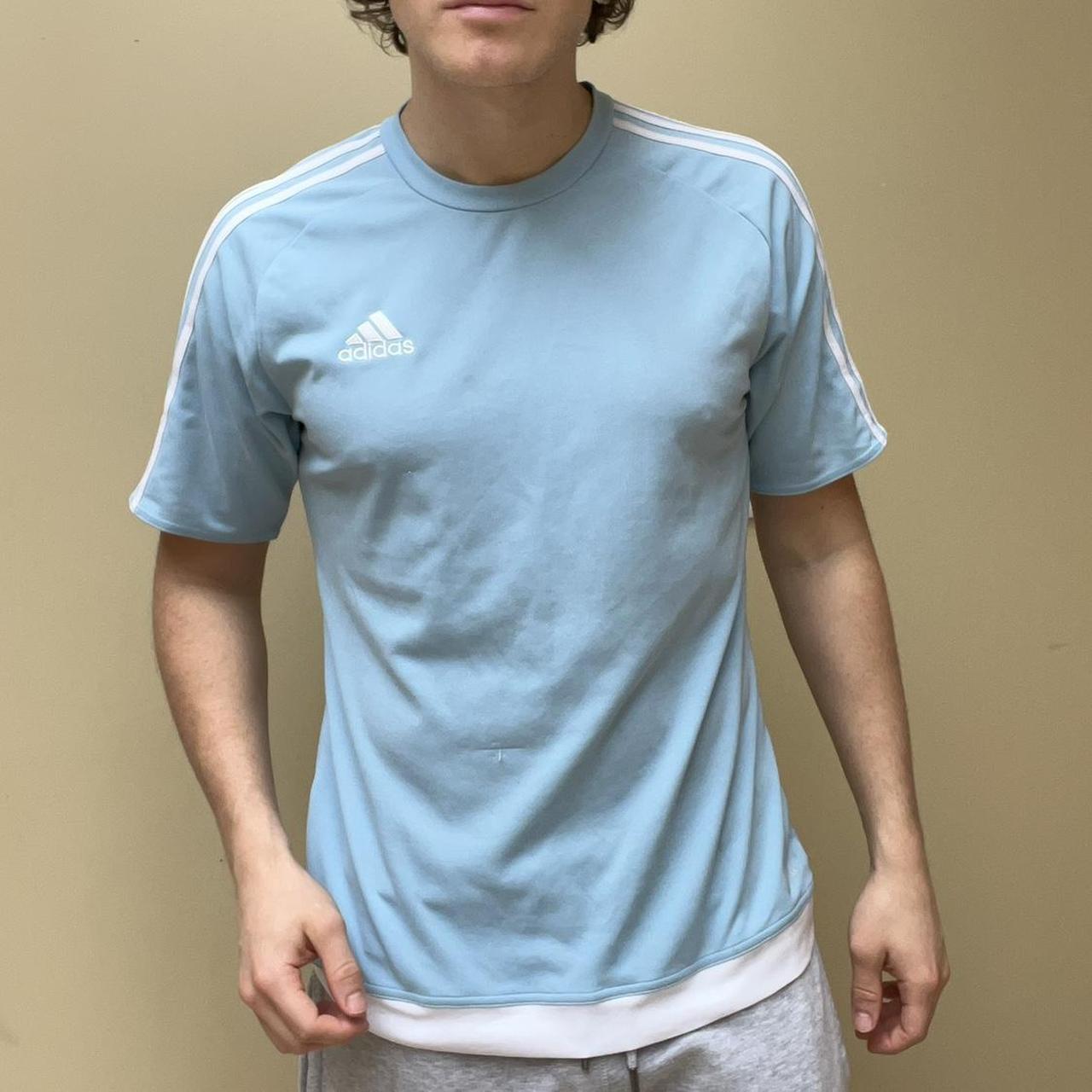 Baby blue adidas sports t shirt. Slight thread pull... Depop