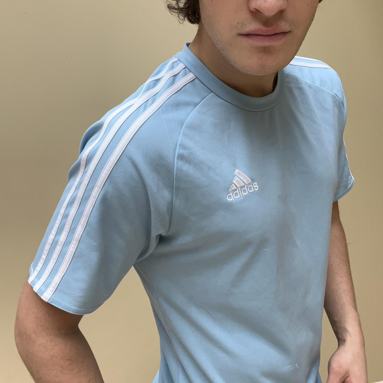 Baby blue adidas sports t shirt. Slight thread pull... Depop