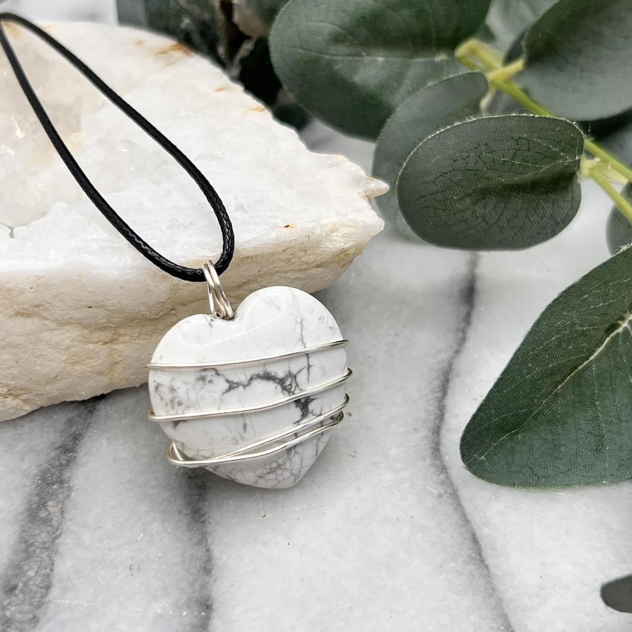 Heart Howlite pendant accompanied by a popular silver chain