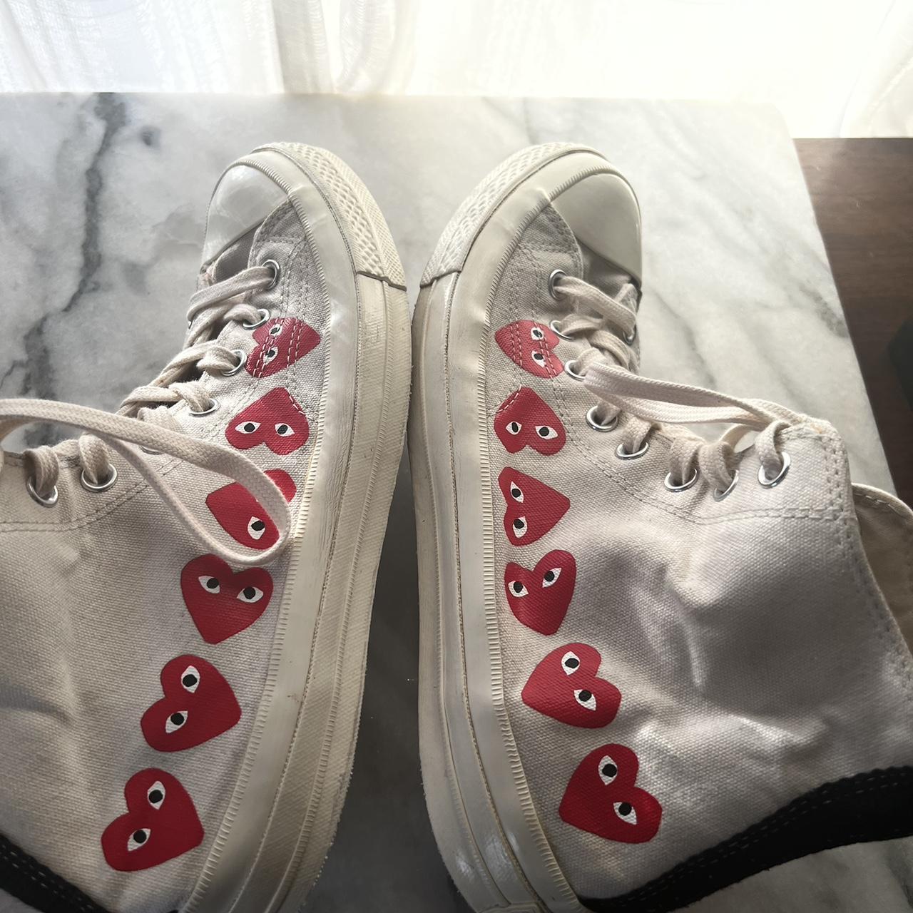 The iconic Comme Des Garçons PLAY off white high top... - Depop