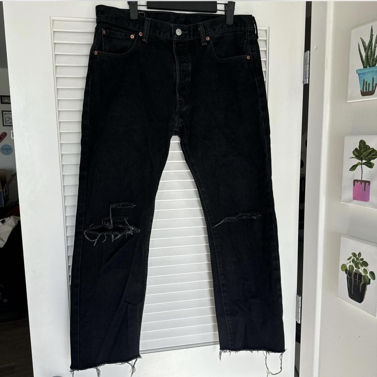 Black distressed levis hotsell