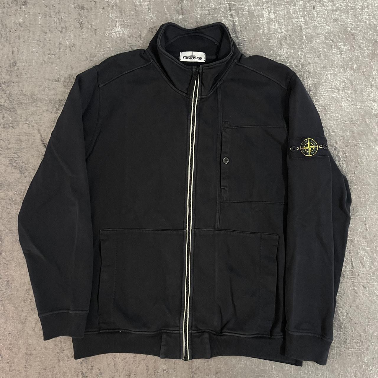 Here is a stone island navy track jacket. This piece... - Depop