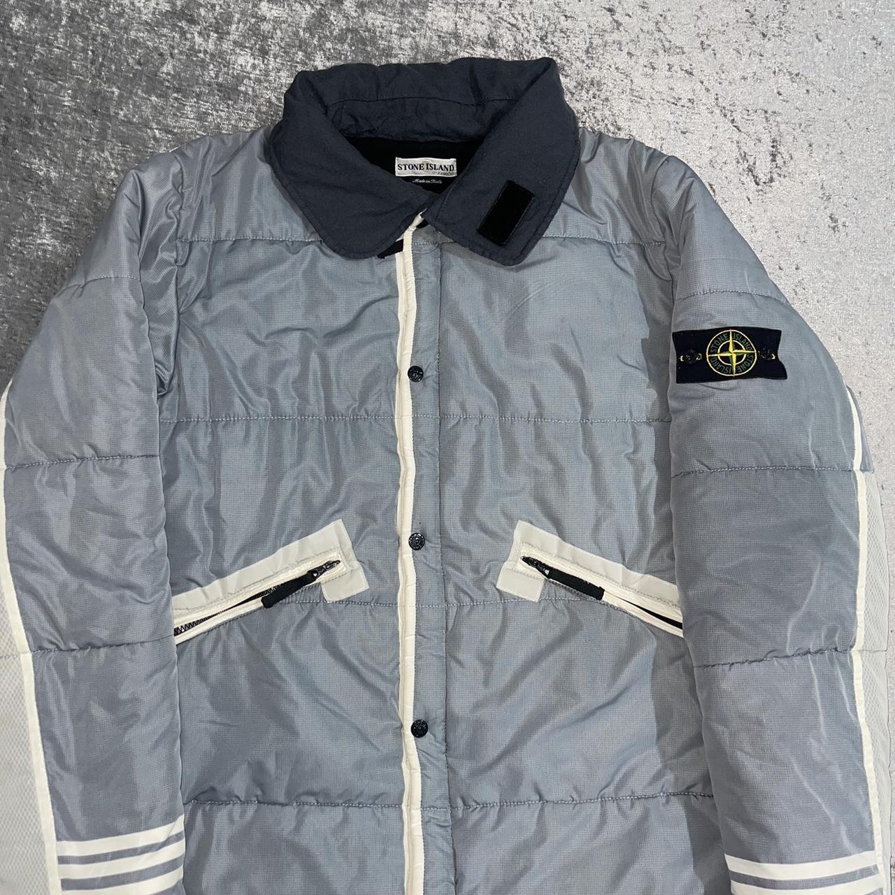 Here is a stone island vintage padded jacket from. Depop