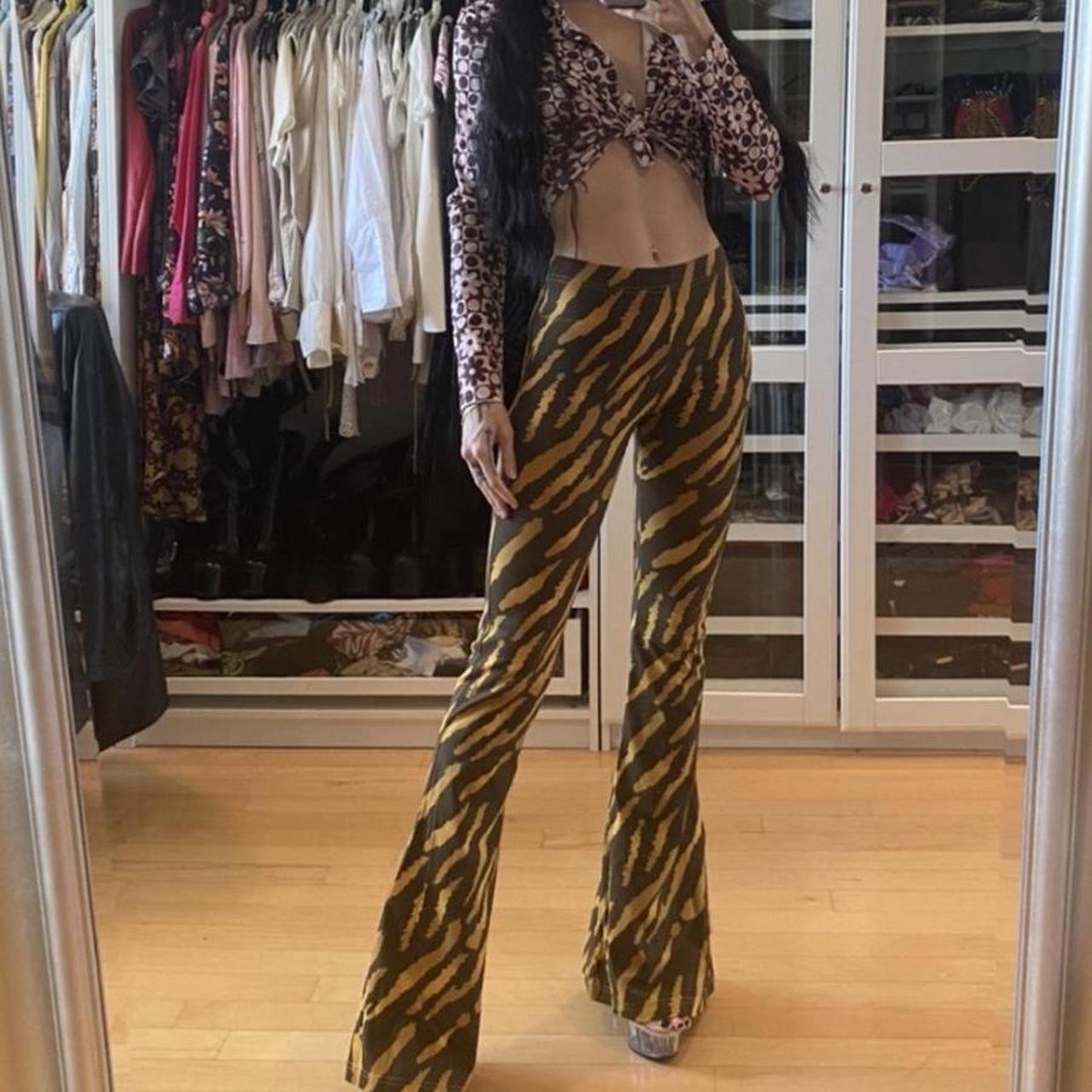 Lovers and drifters tiger print flare pants. Size