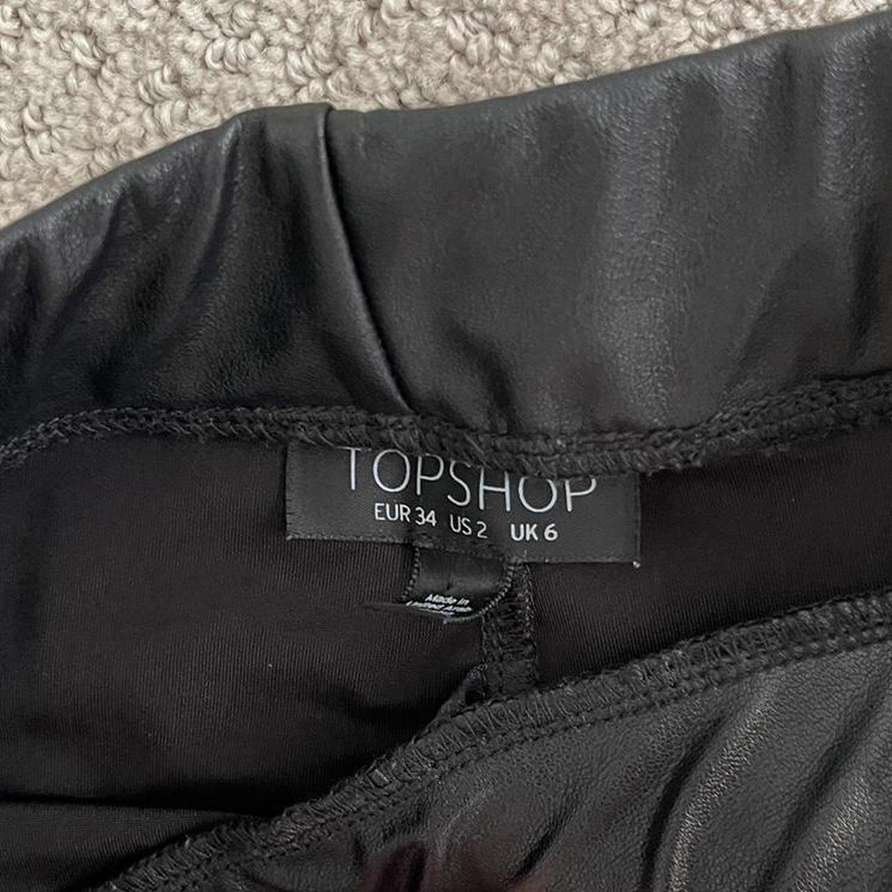 Topshop vinyl leggings in black with size zip. Worn - Depop