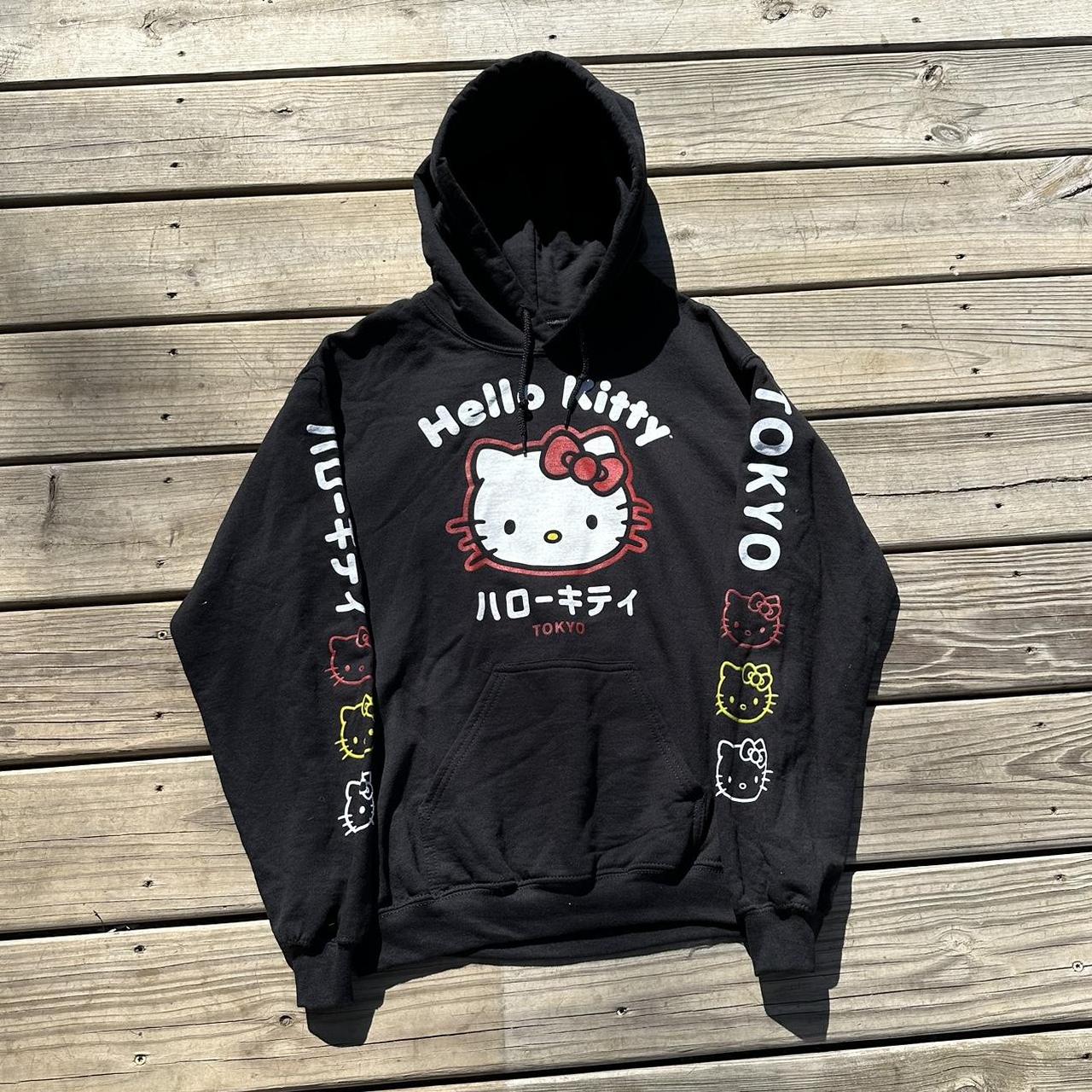 Hello Kitty black waterproof vinyl wraparound - Depop