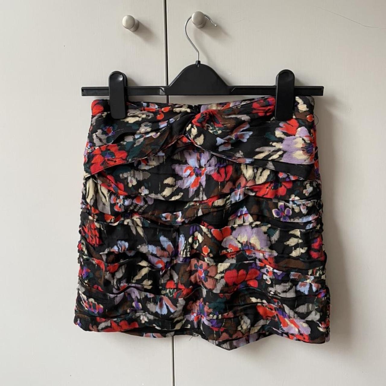 Zara size small black floral mini skirt. Knot detail... Depop