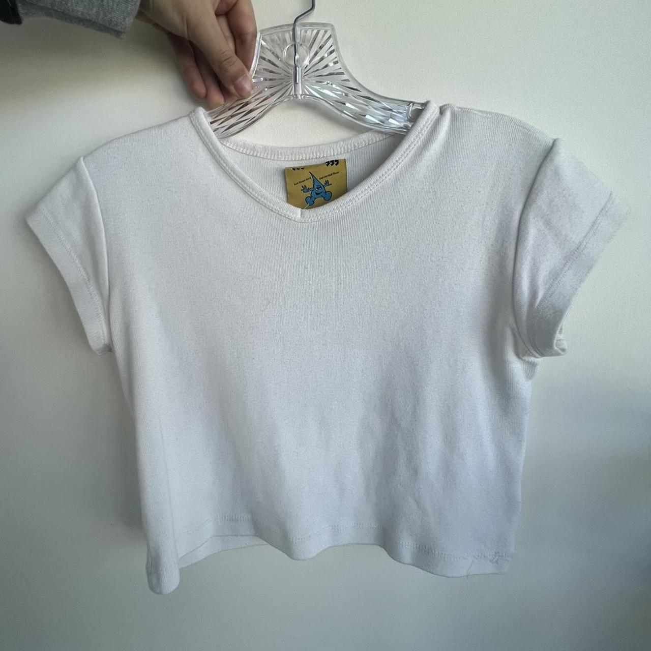 white unif baby tee! size XS. there is one small... - Depop