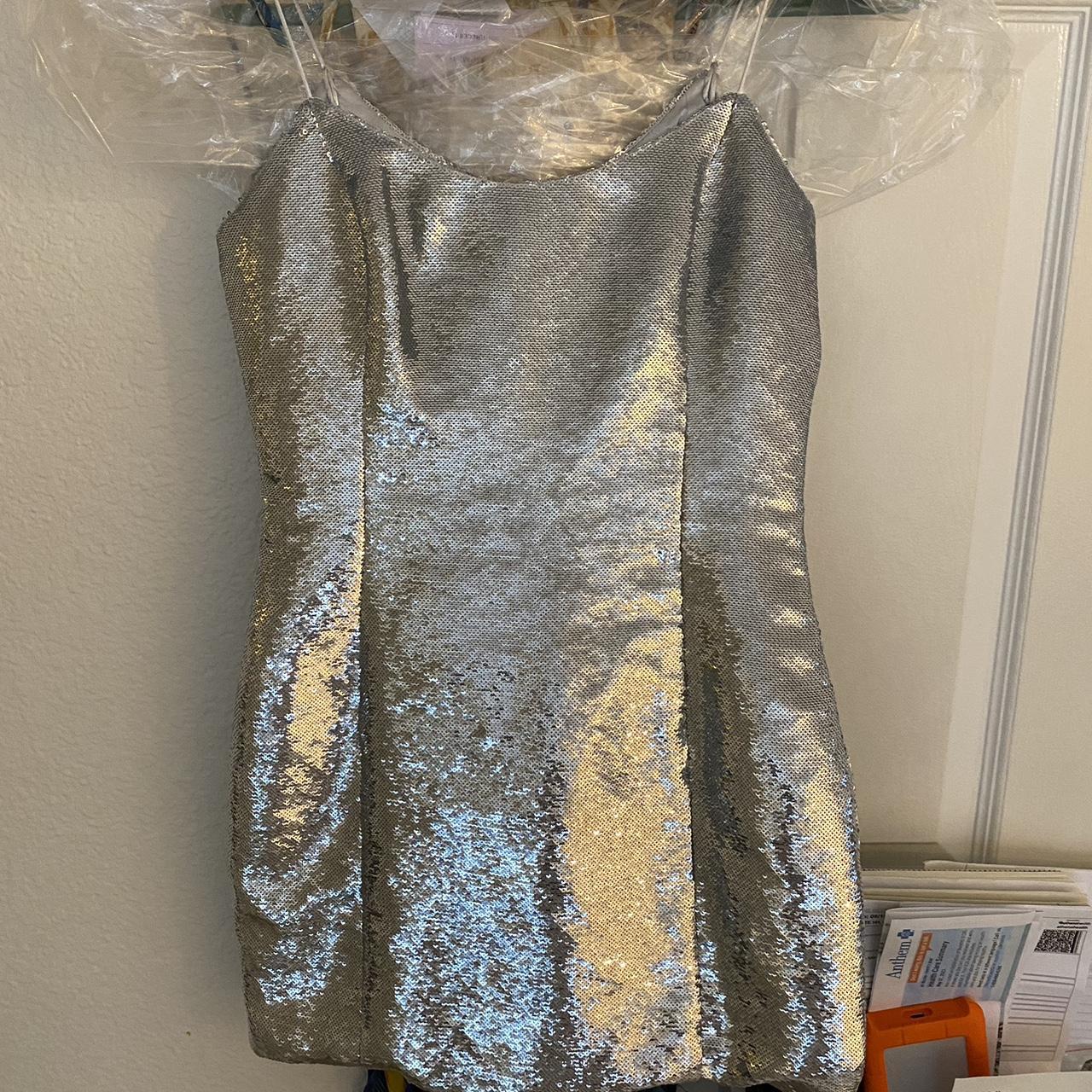 Meshki silver sequin mini dress. Super flattering... - Depop