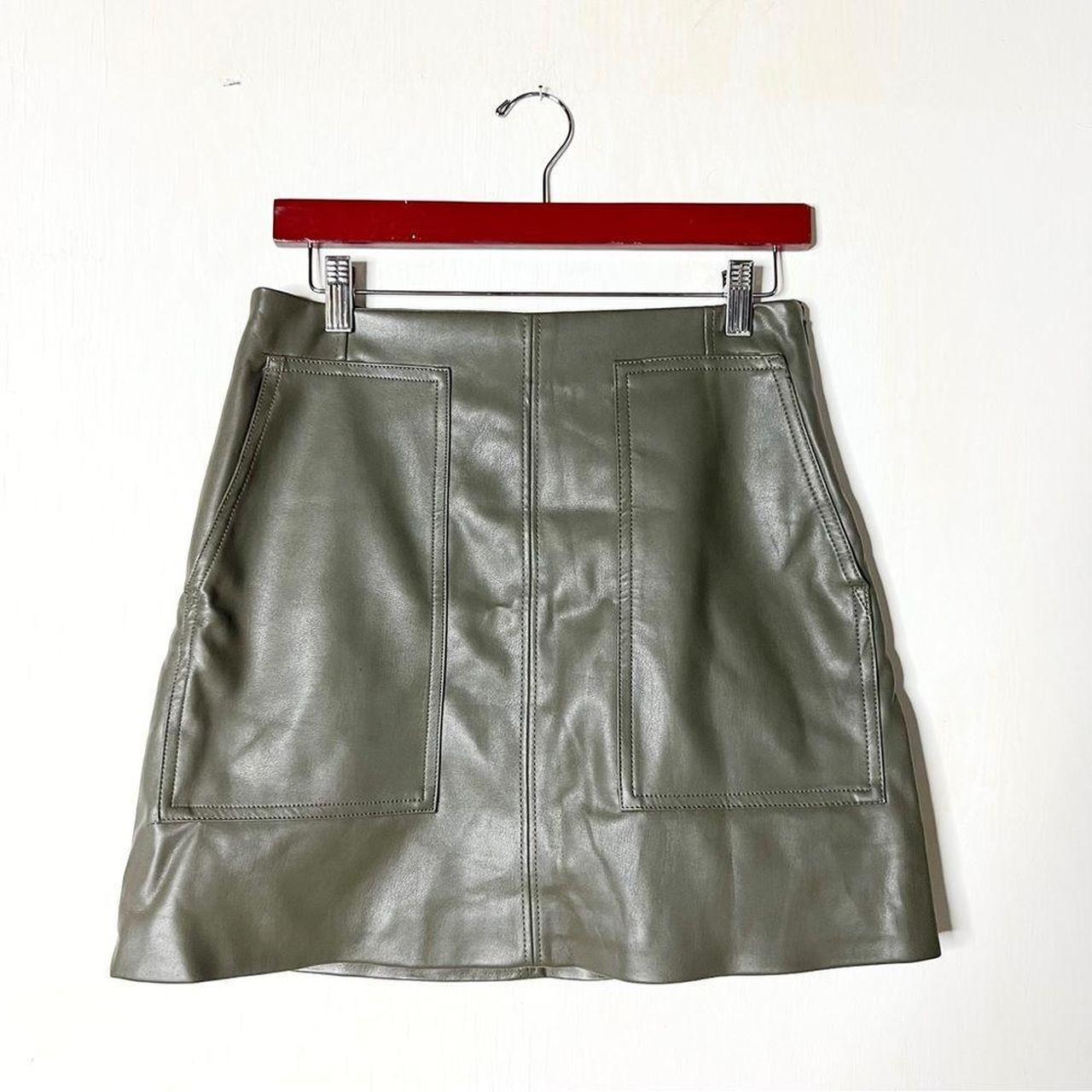 Green faux leather mini skirt with oversized