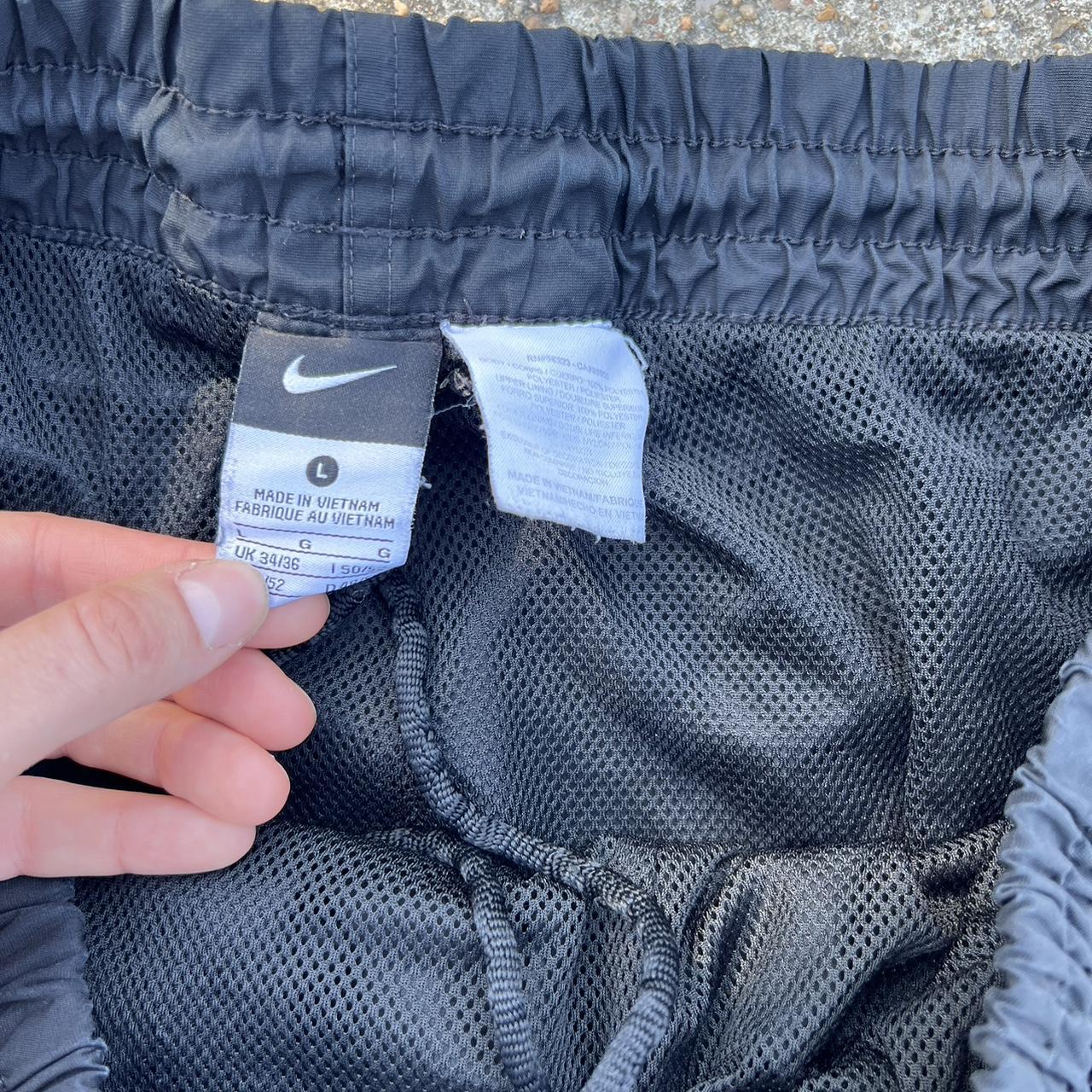 Nike Track Pants L They have a hole on the side... Depop