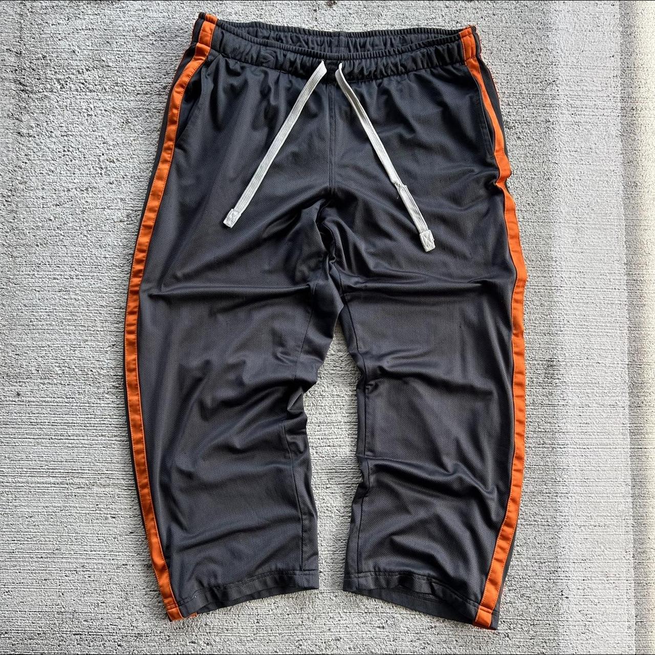 Grey nike tracksuit store with orange stripe