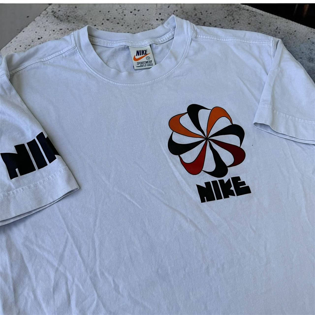 Nike pinwheel t shirt hotsell