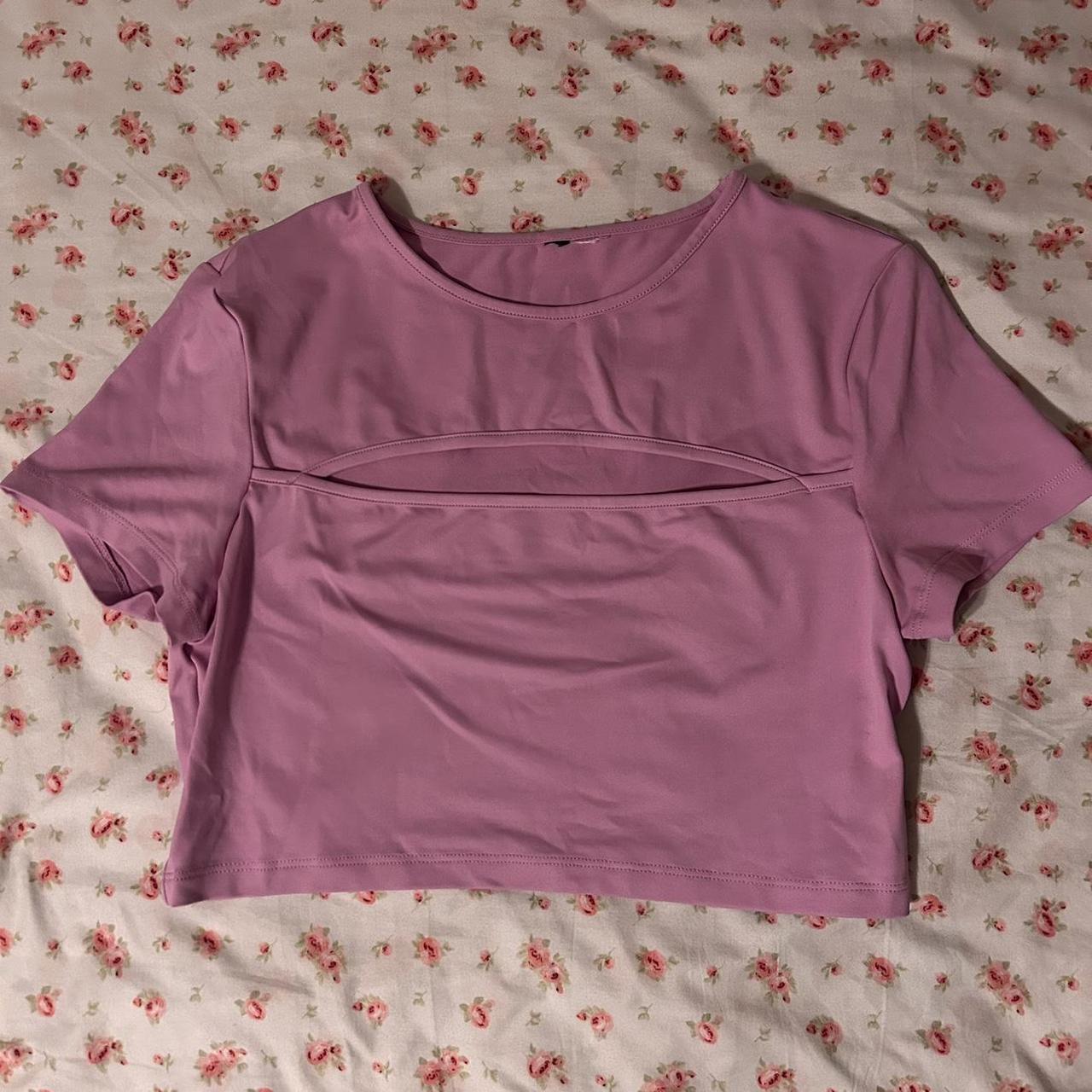 XS baby pink crop top with slit above chest super... Depop