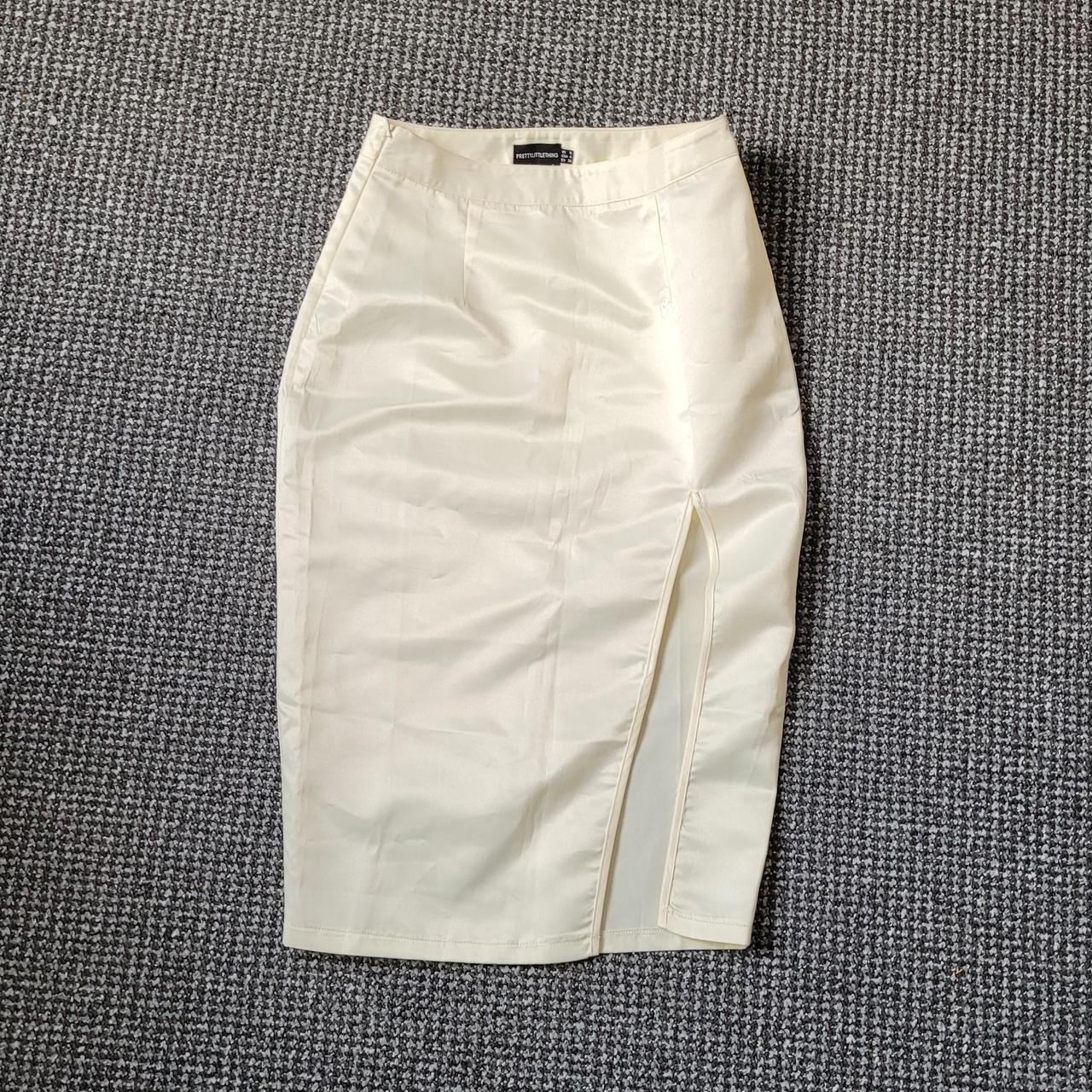 Off white satin midi skirt with thigh slit Brand new... - Depop