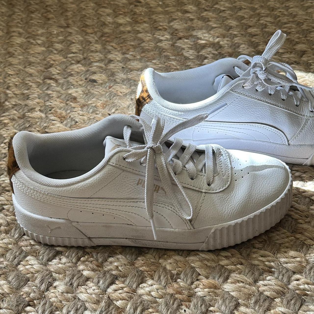 White Puma sneakers with small cheetah patch on the... - Depop