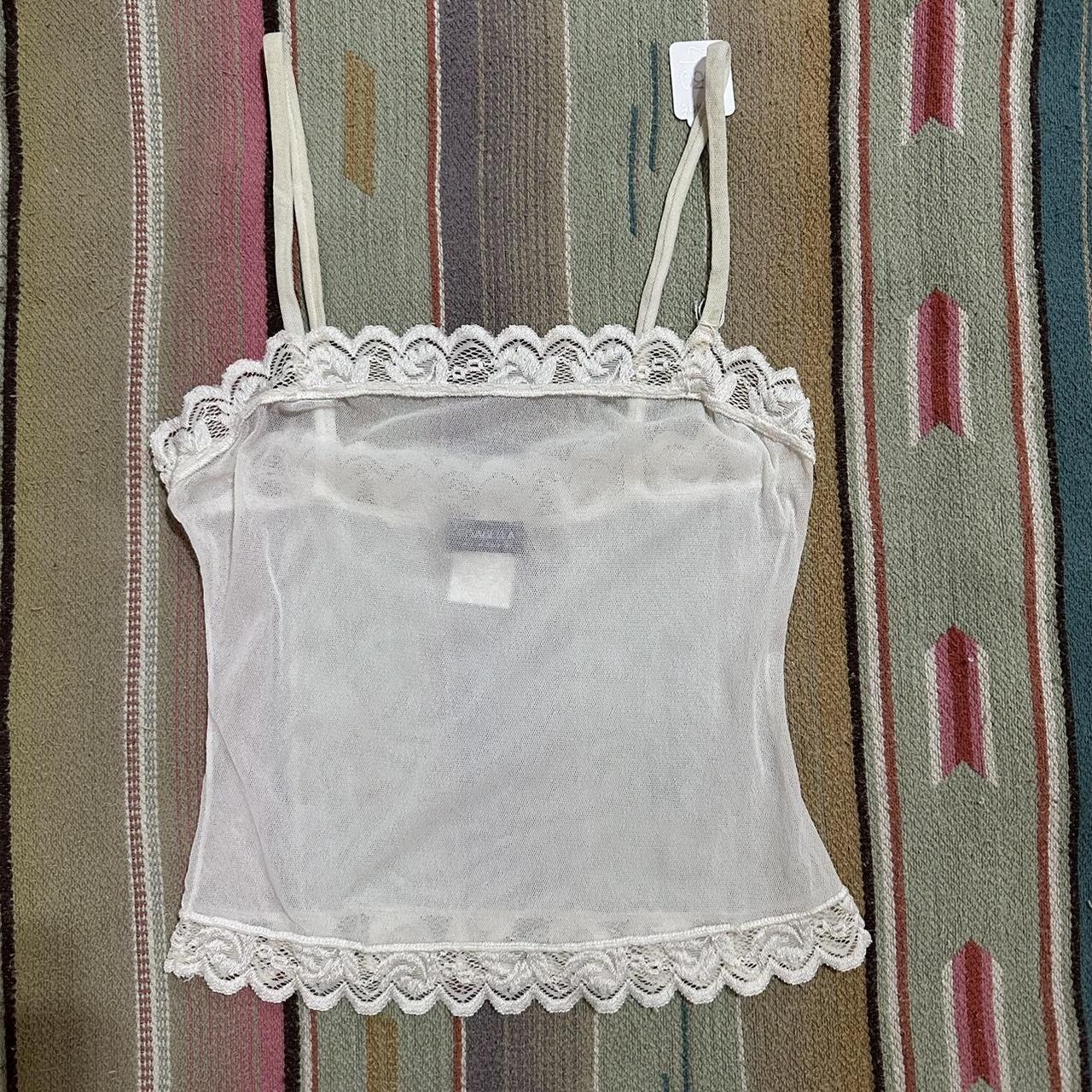 small sheer cosabella top with white lace trim... - Depop