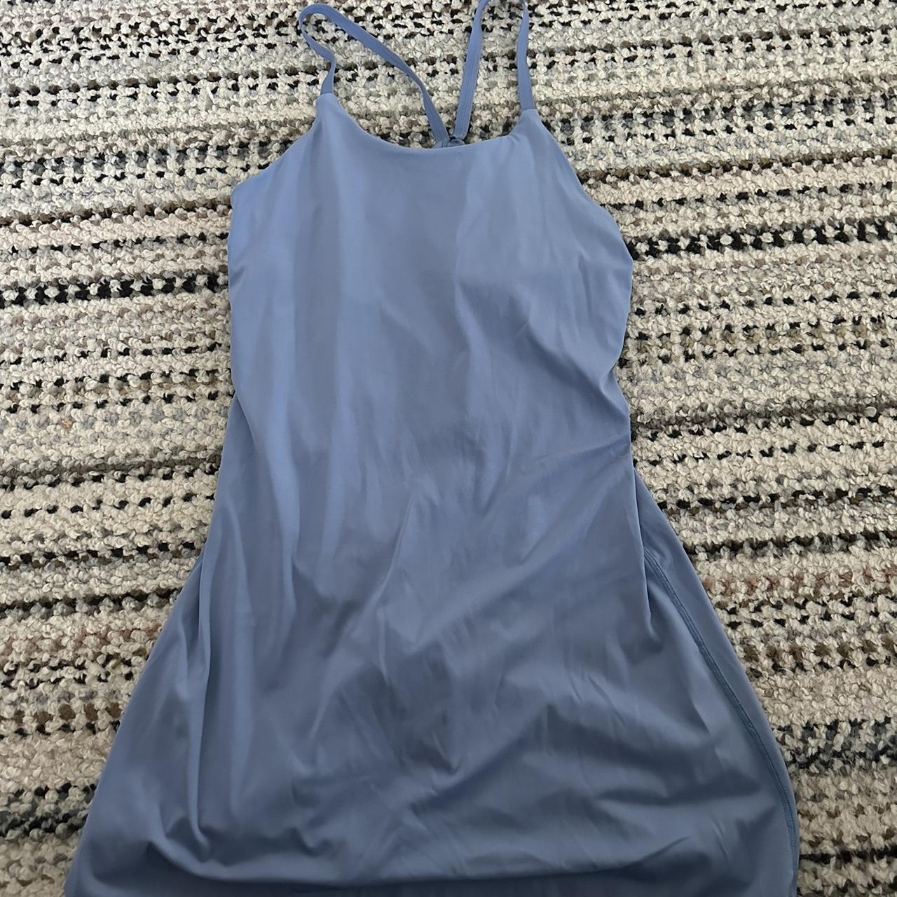 high neck athletic dress with built in shorts, like... Depop