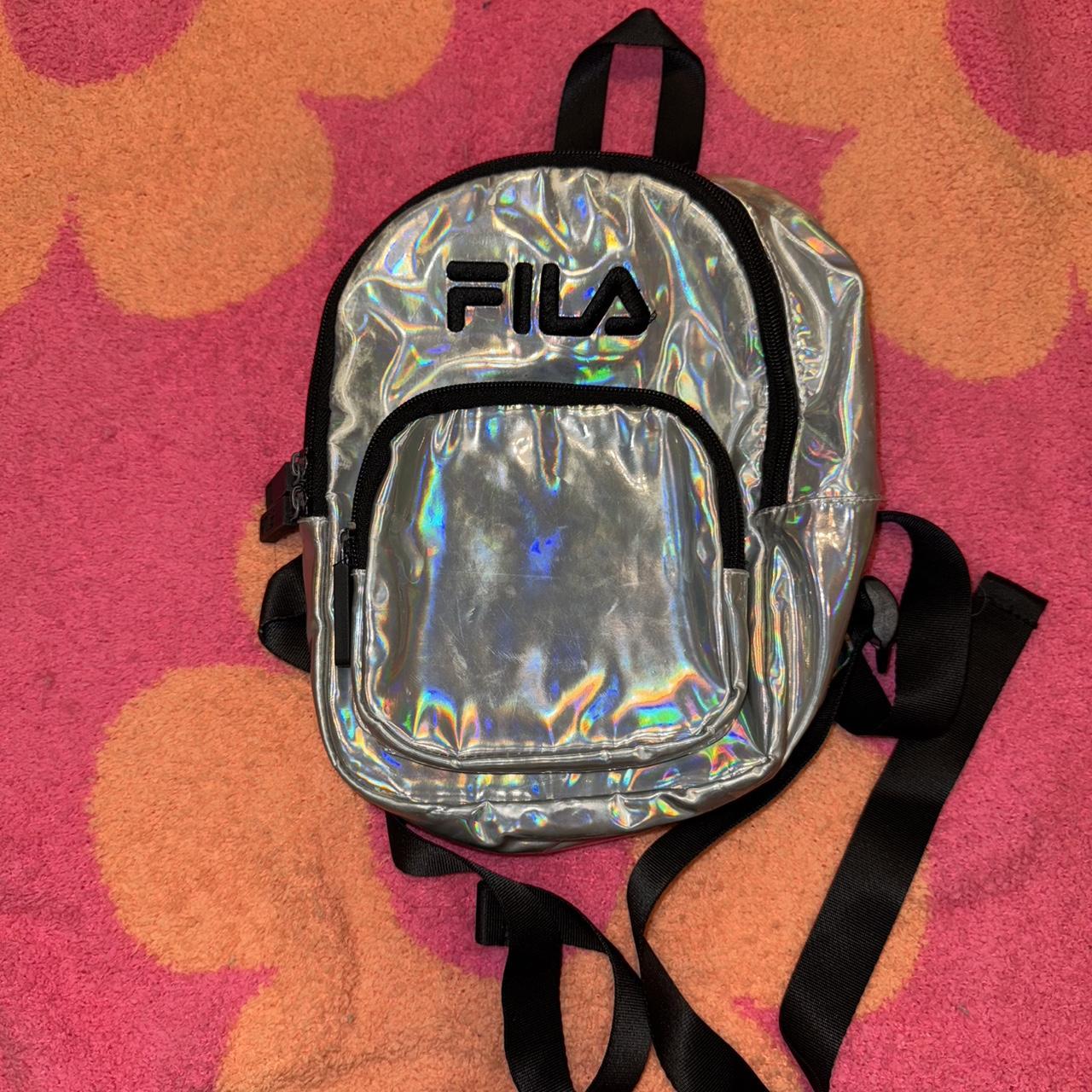 Fila holographic mini backpack. Is a little worn out. Depop