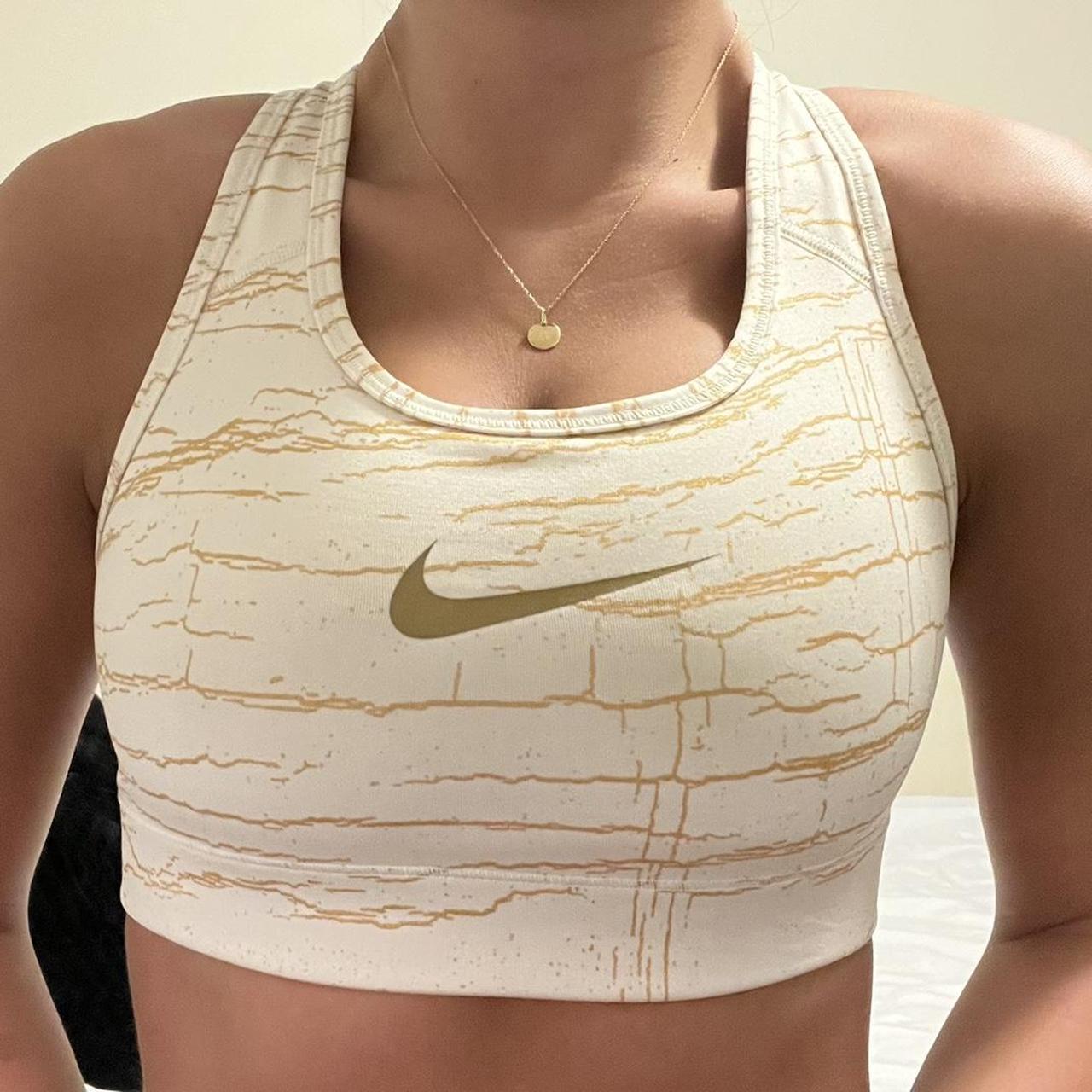 Super sick unique gold electric Nike sports bra top. - Depop