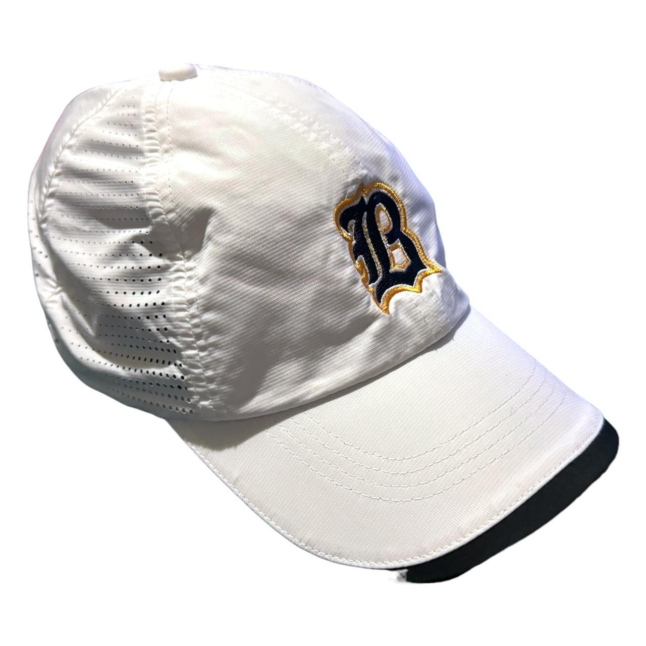 white and gold nike hat