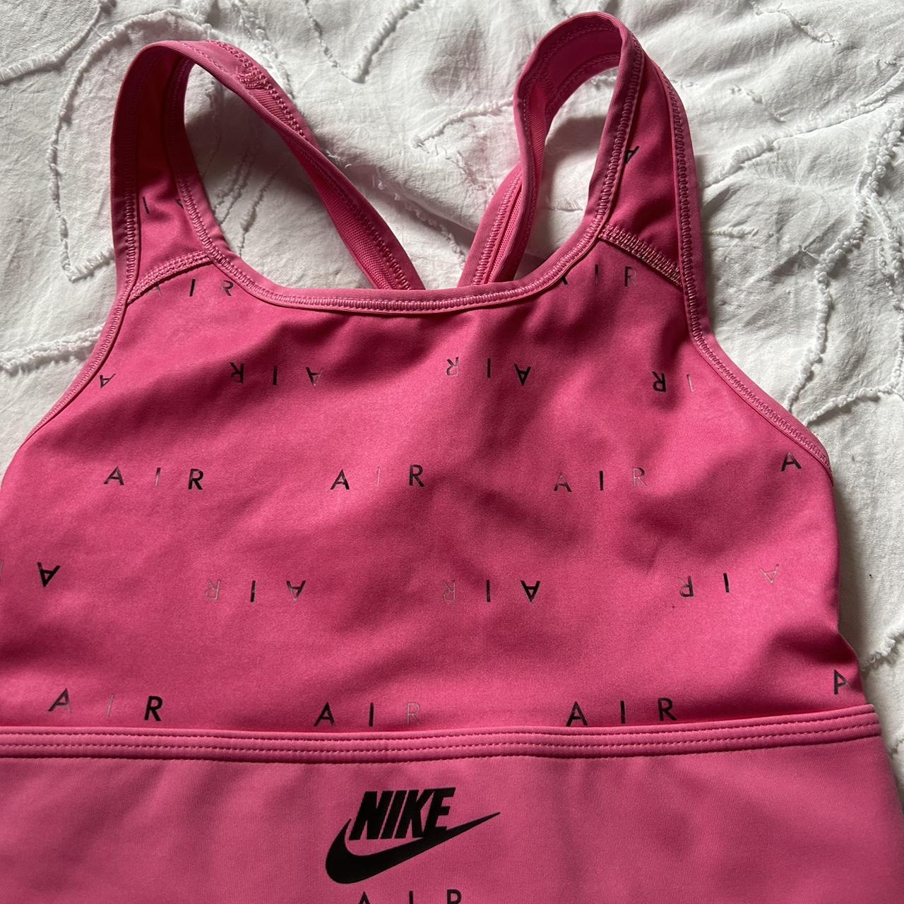 Pink Nike dri-fit sports bra Worn once but too... - Depop