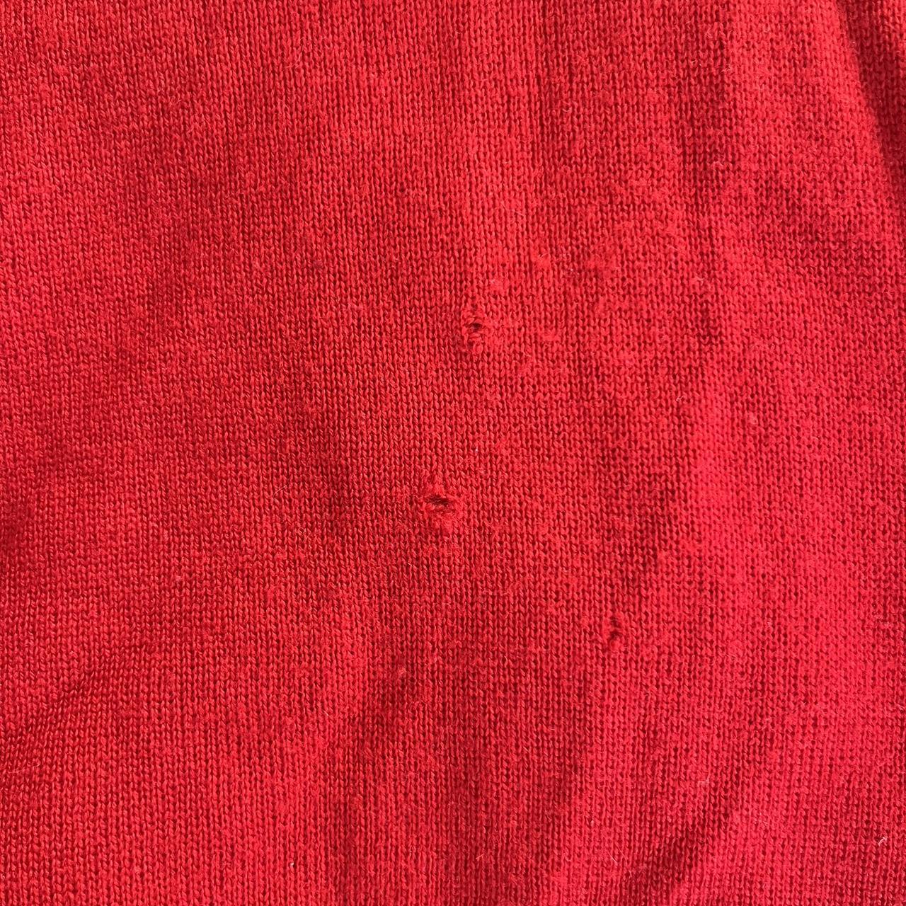 Red merino wool jumper. There are a few small holes... - Depop