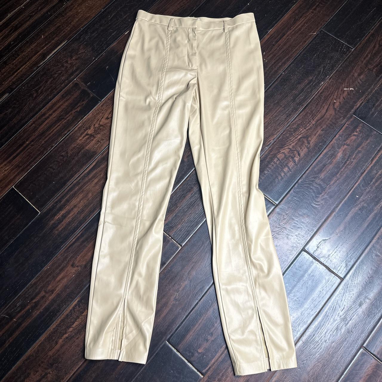Faux leather pants with front slit at bottom. Very - Depop