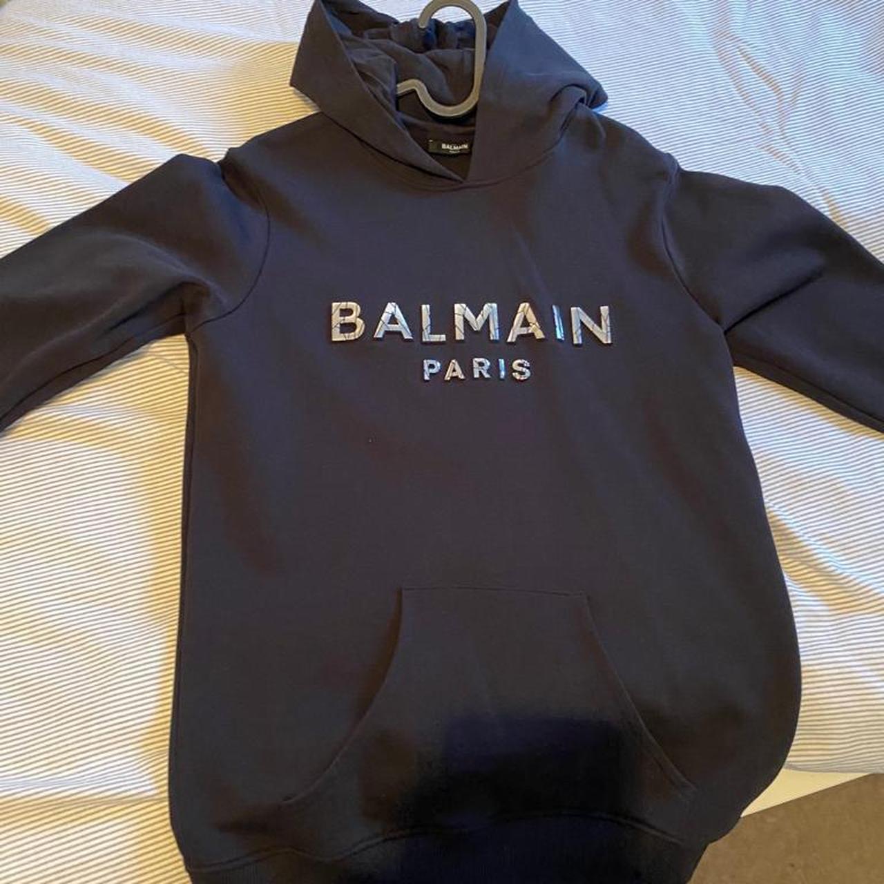 Black Balmain hoody age 16. Tickets removed but... - Depop