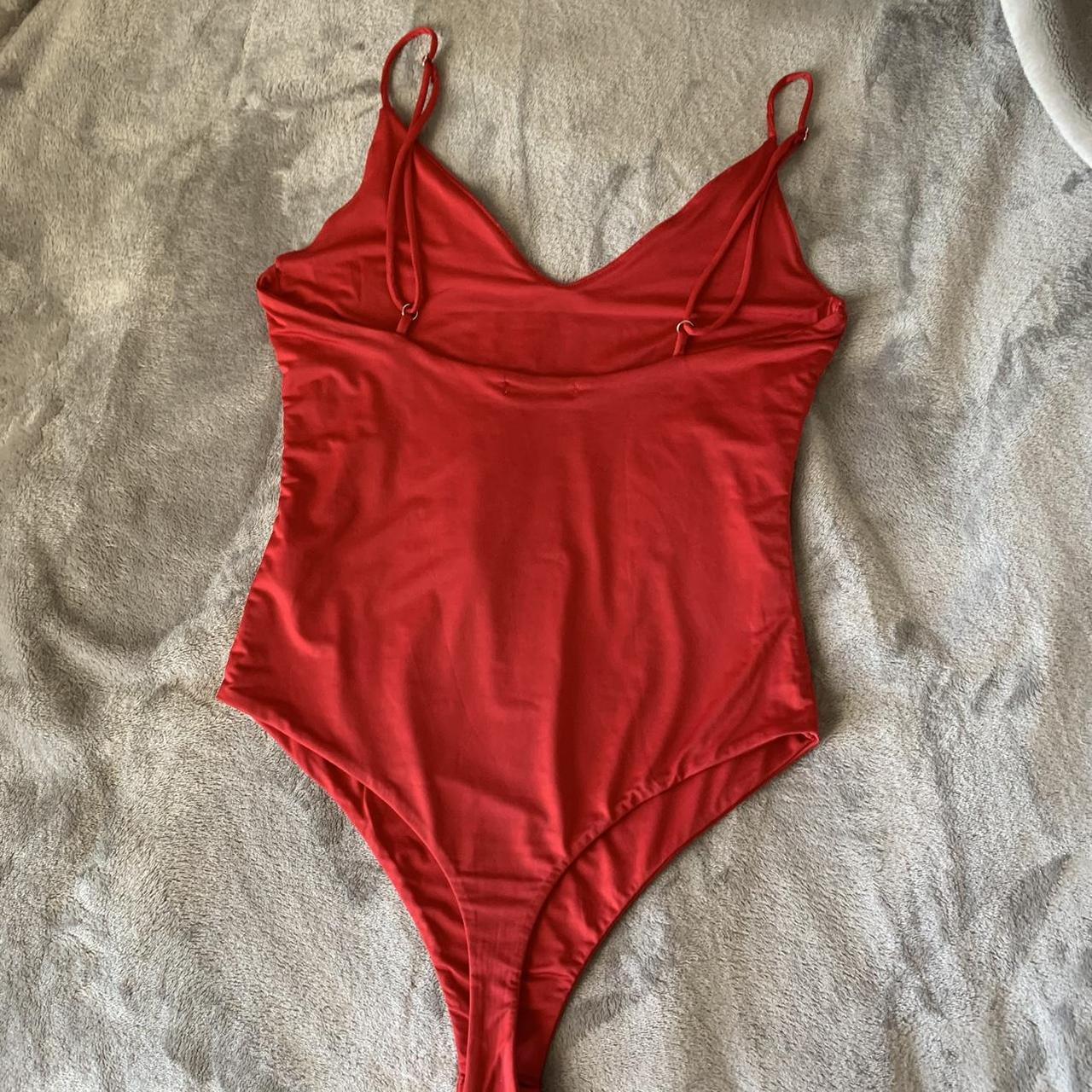 red satin fashion nova body suit *no tag but fits... Depop