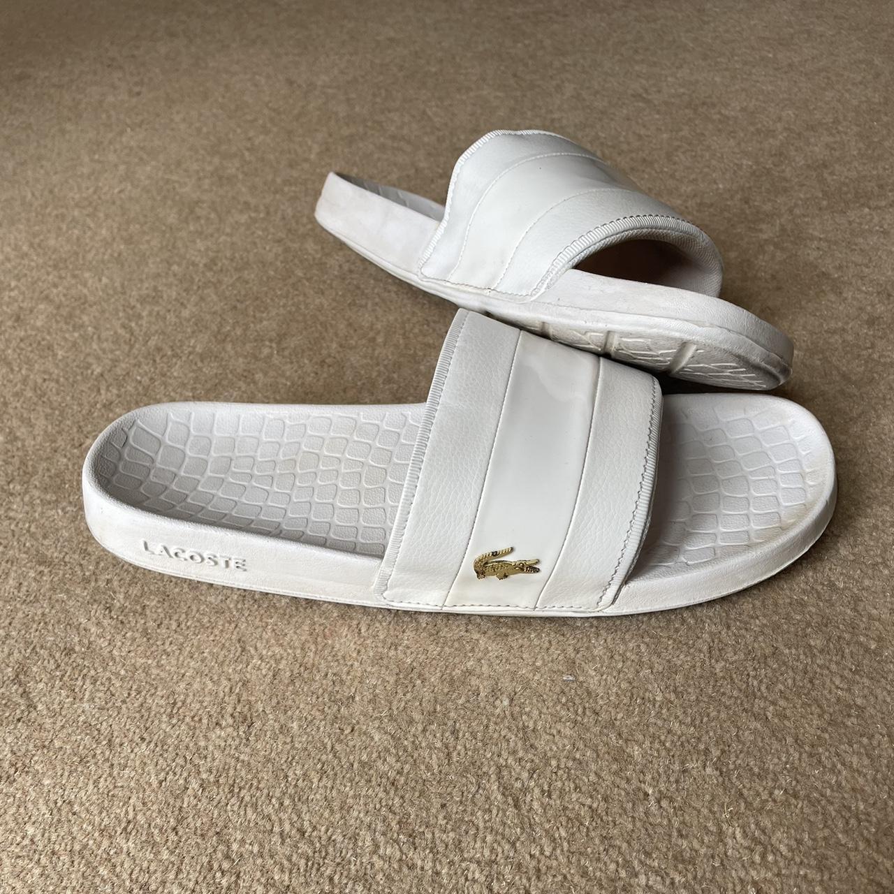 White and shop gold lacoste slides