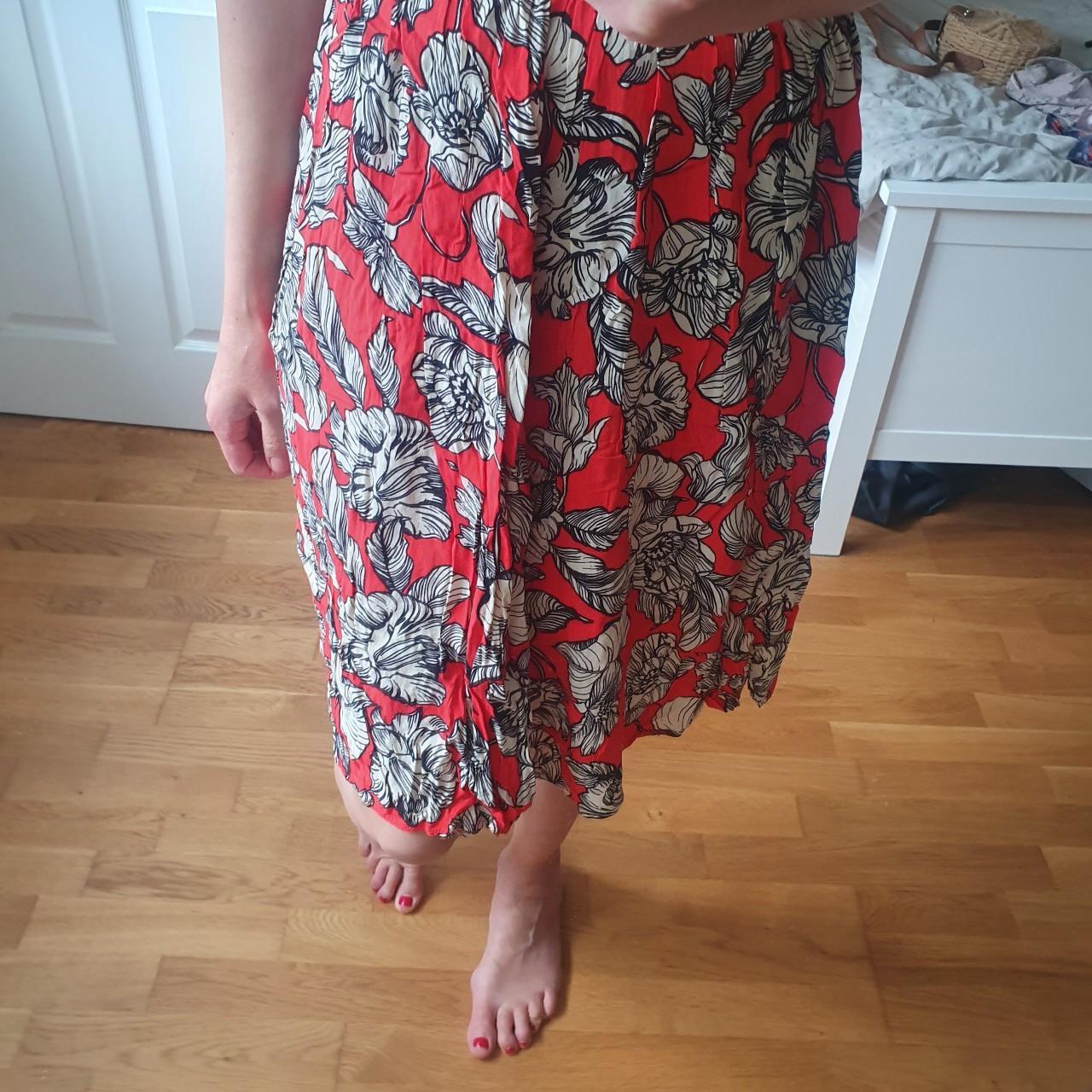 Primark red floral knee length skirt Primark. Depop