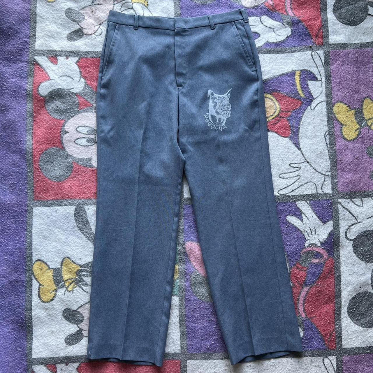 Pants with store drawings on them