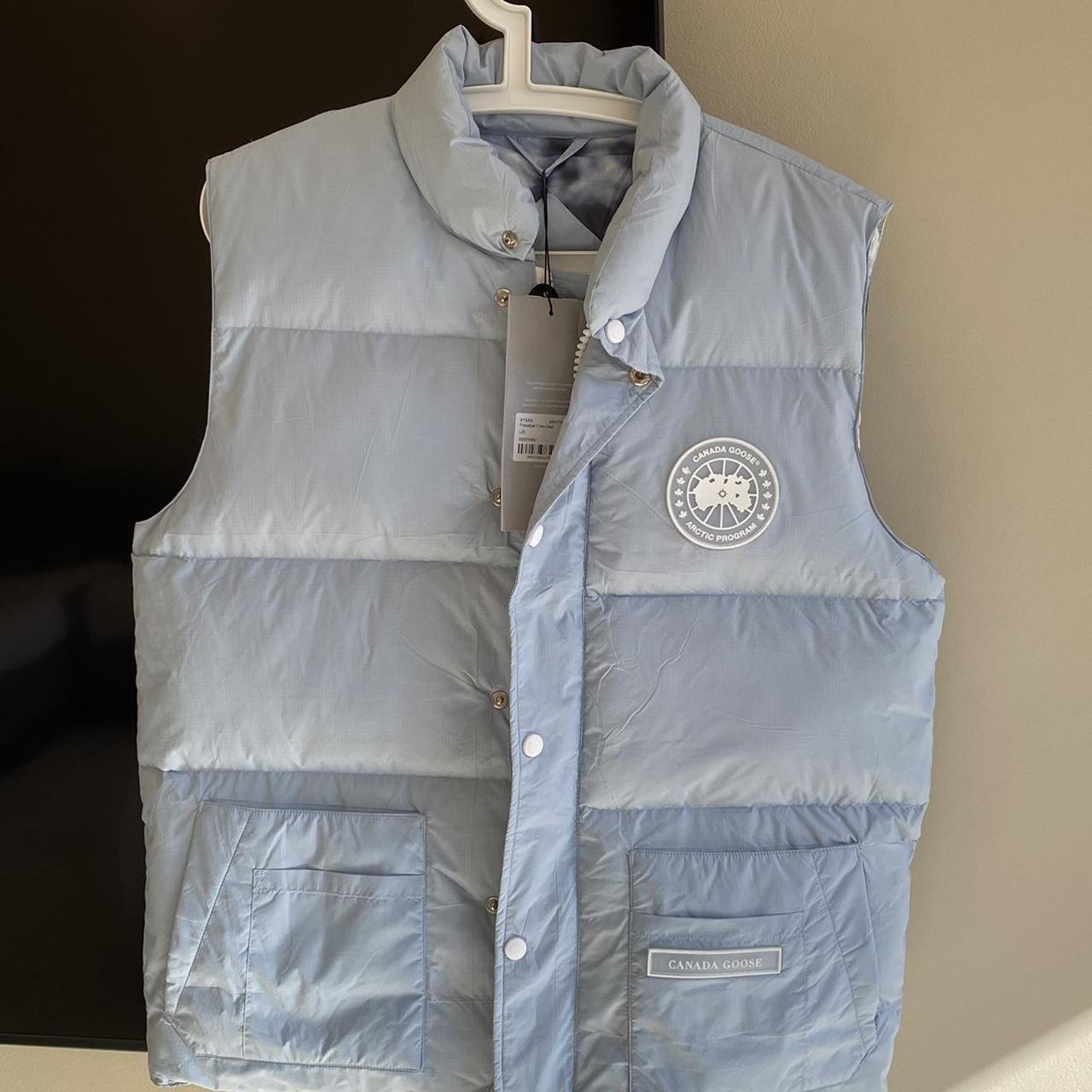 Canada Goose Men's Blue and White Gilet | Depop