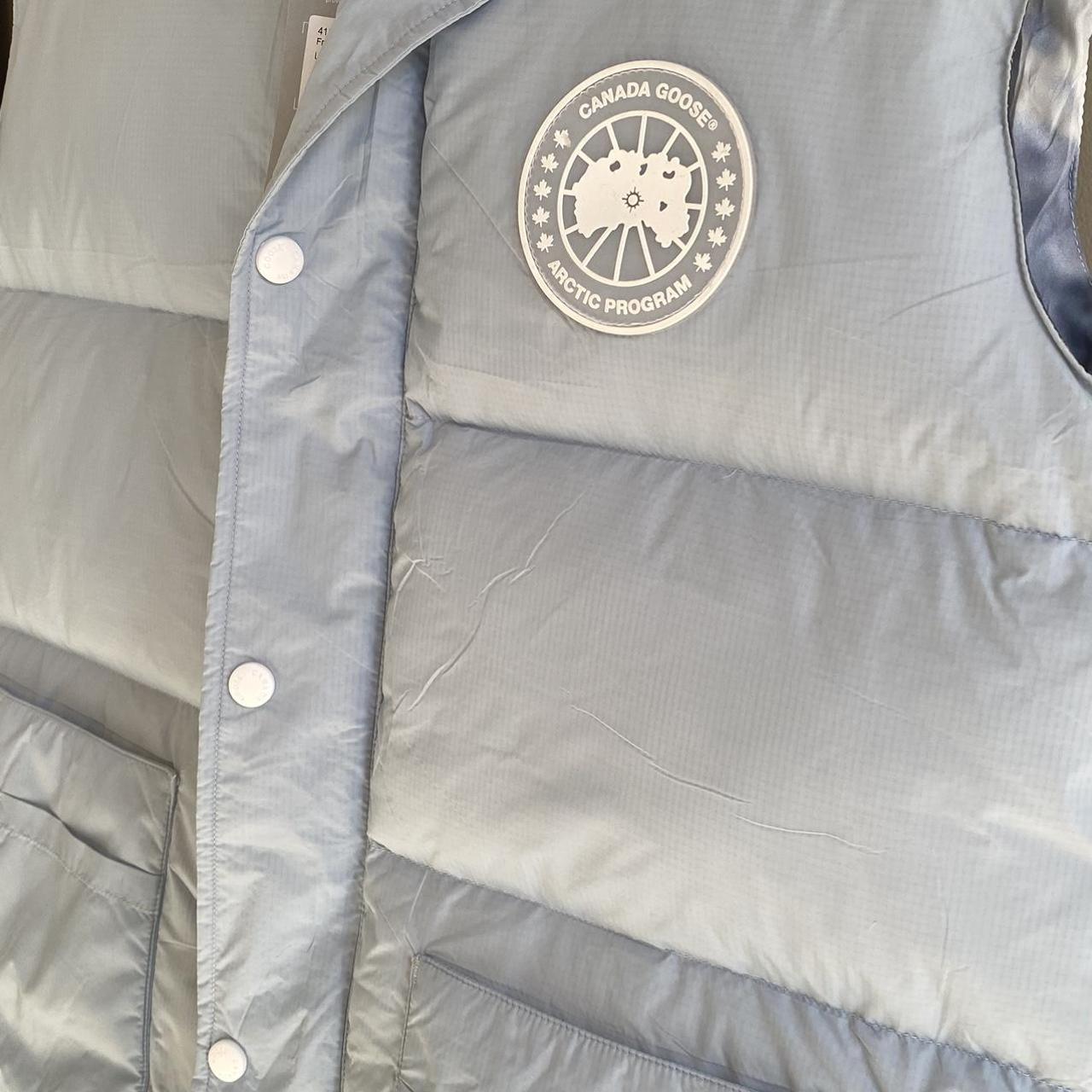 Canada Goose Men's Blue and White Gilet | Depop