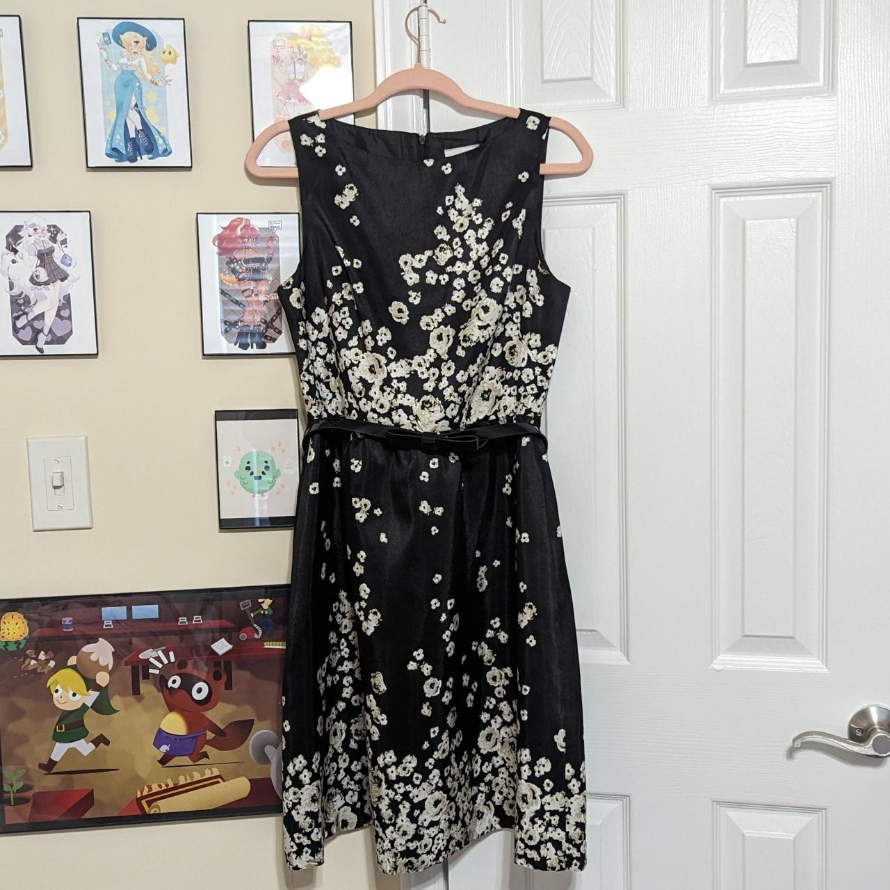 J. Taylor black dress with white flowers and a