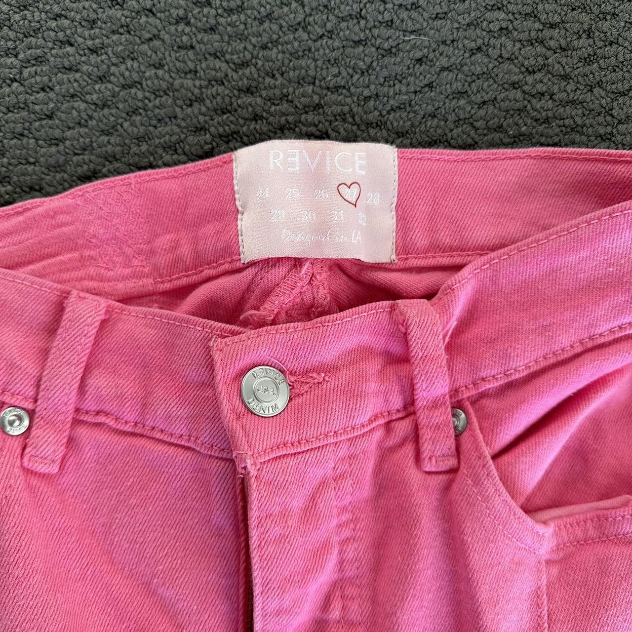 Revice denim pink skin flared jeans with star on back Depop