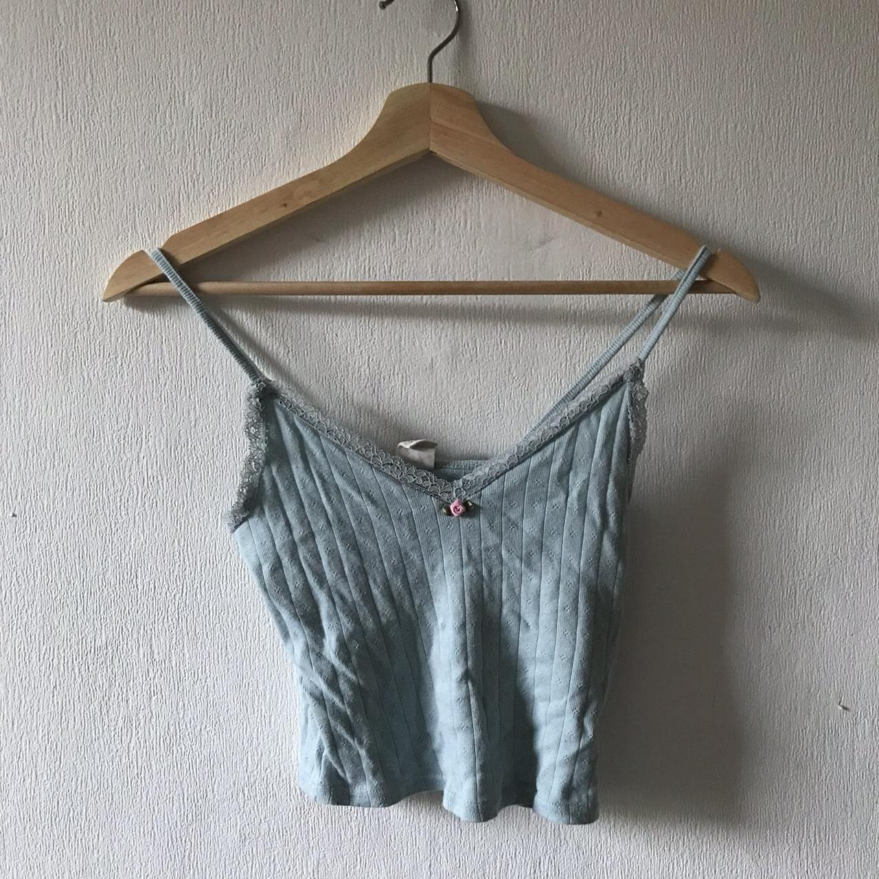 cute little baby blue vest top uk 8 perf for casual... Depop