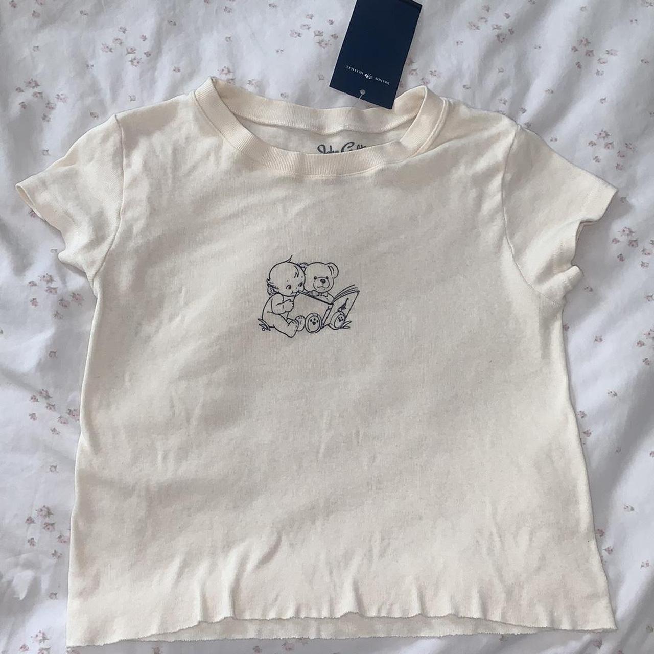 NWT BRANDY BABY TEE Kewpie cherubs baby tee from... - Depop