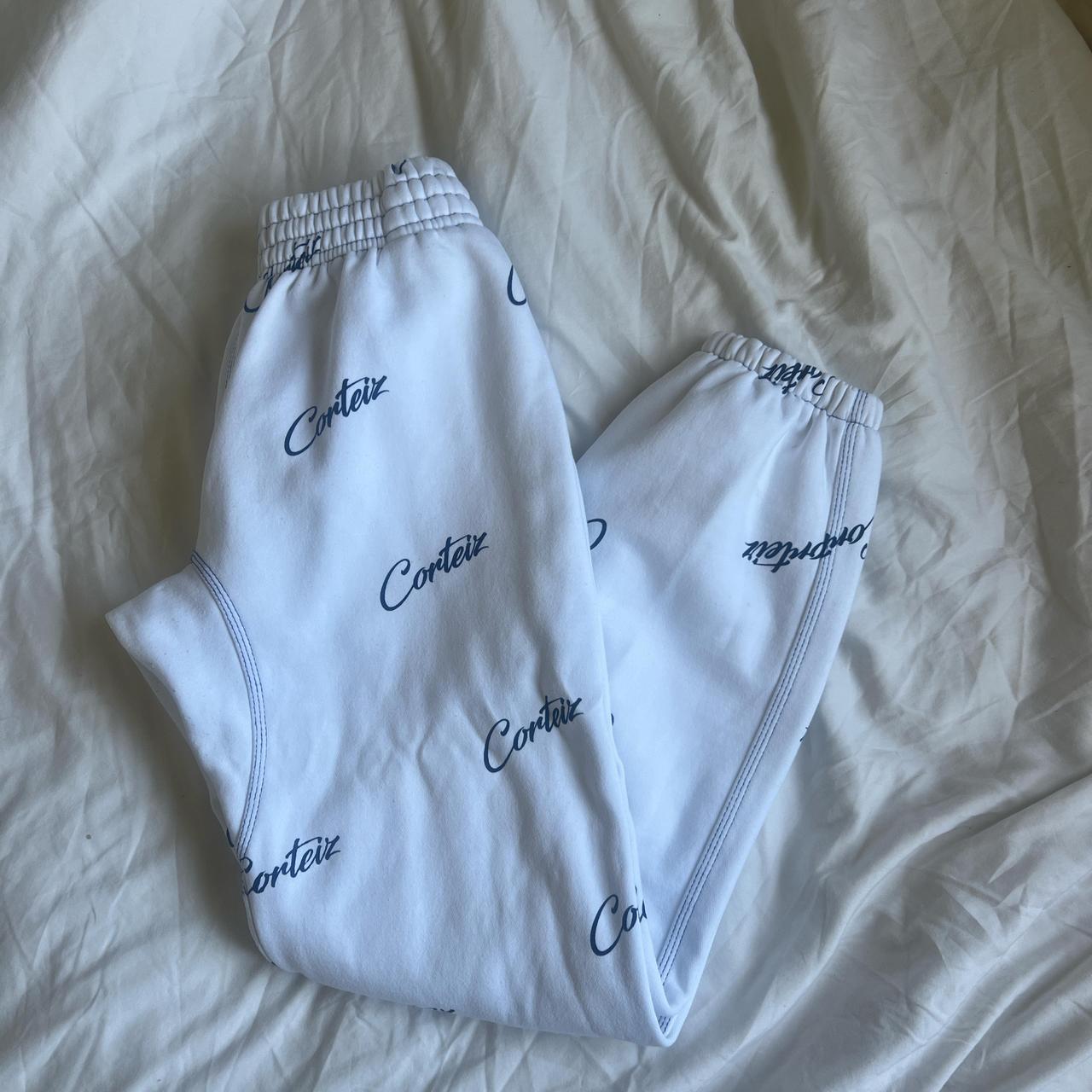 White joggers with writing sale