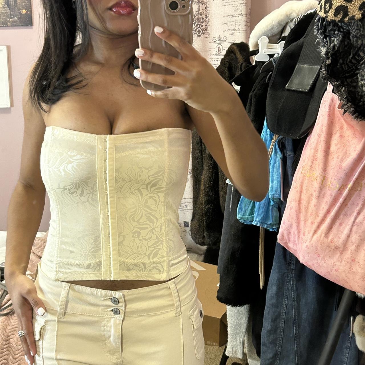 beige corset that can double as a top. big boob