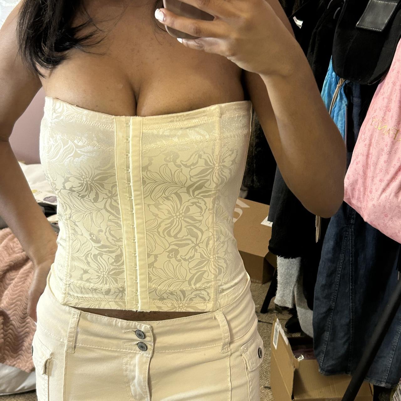 beige corset that can double as a top. big boob