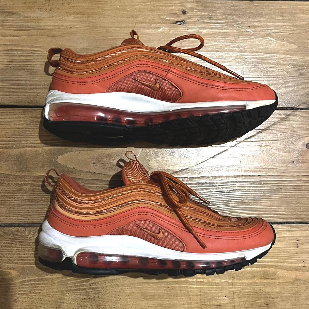 Black and clearance orange 97s